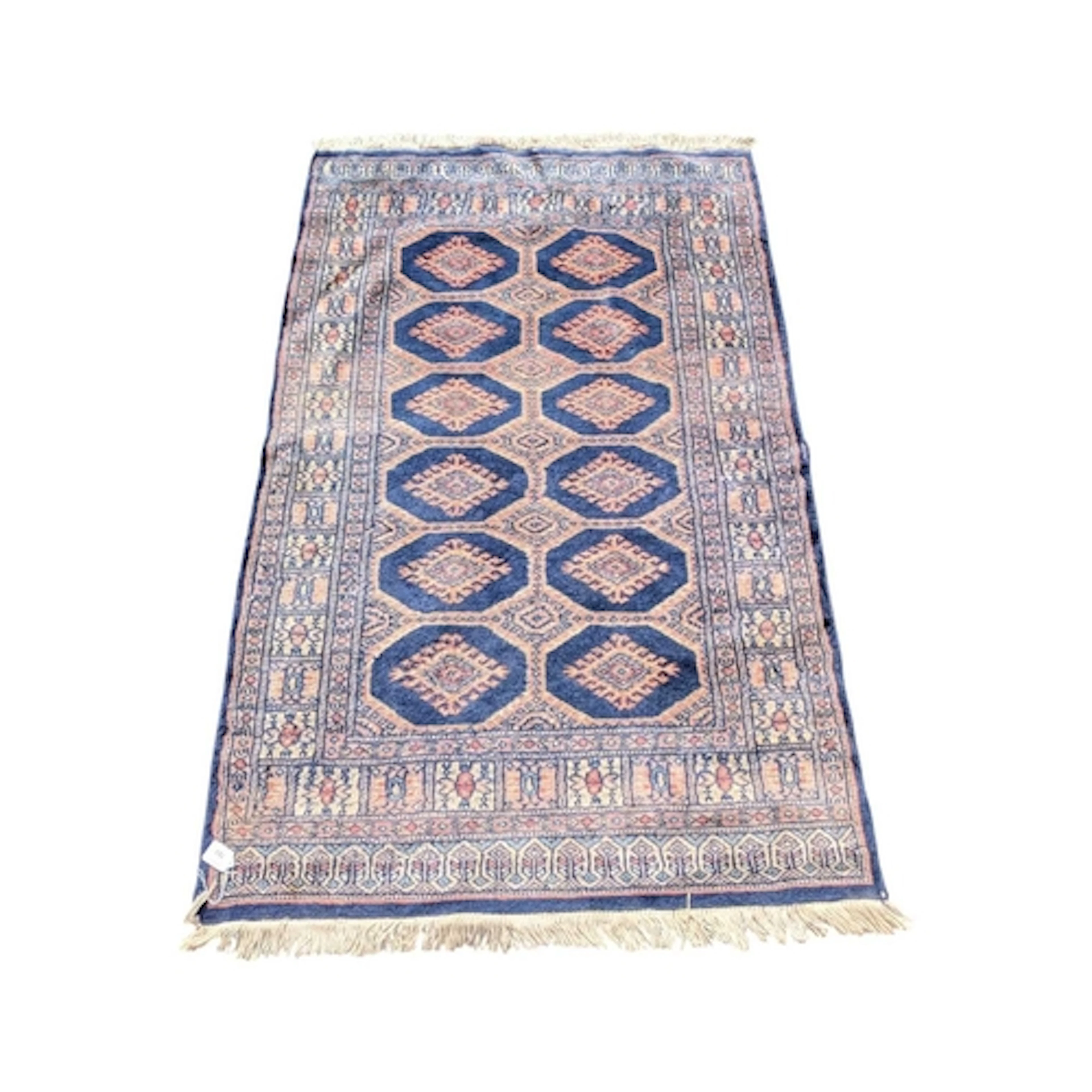 A vintage 20th century Persian Islamic Bokhara floor rug. Re...