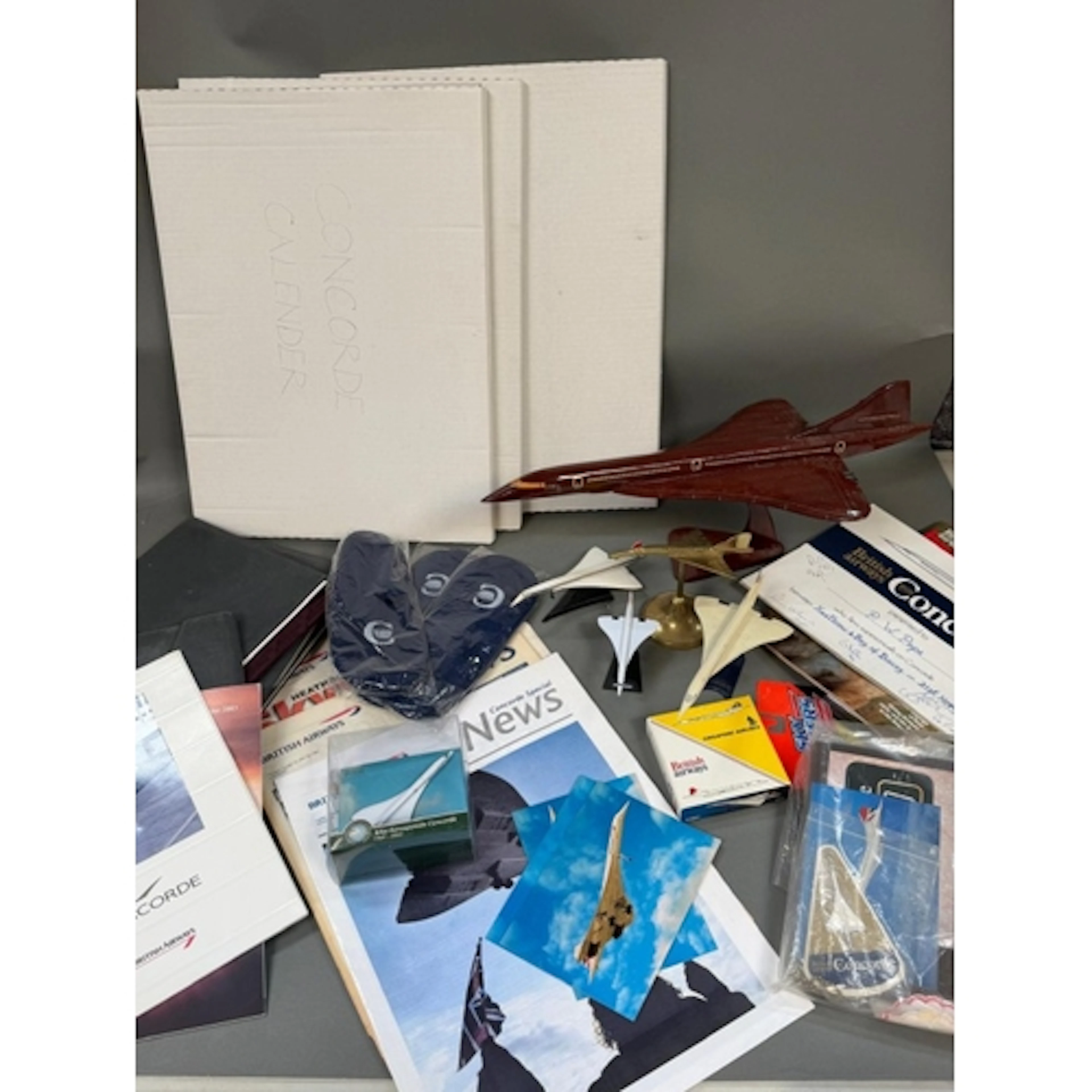 A large selection of Concorde memorabilia to include model p...