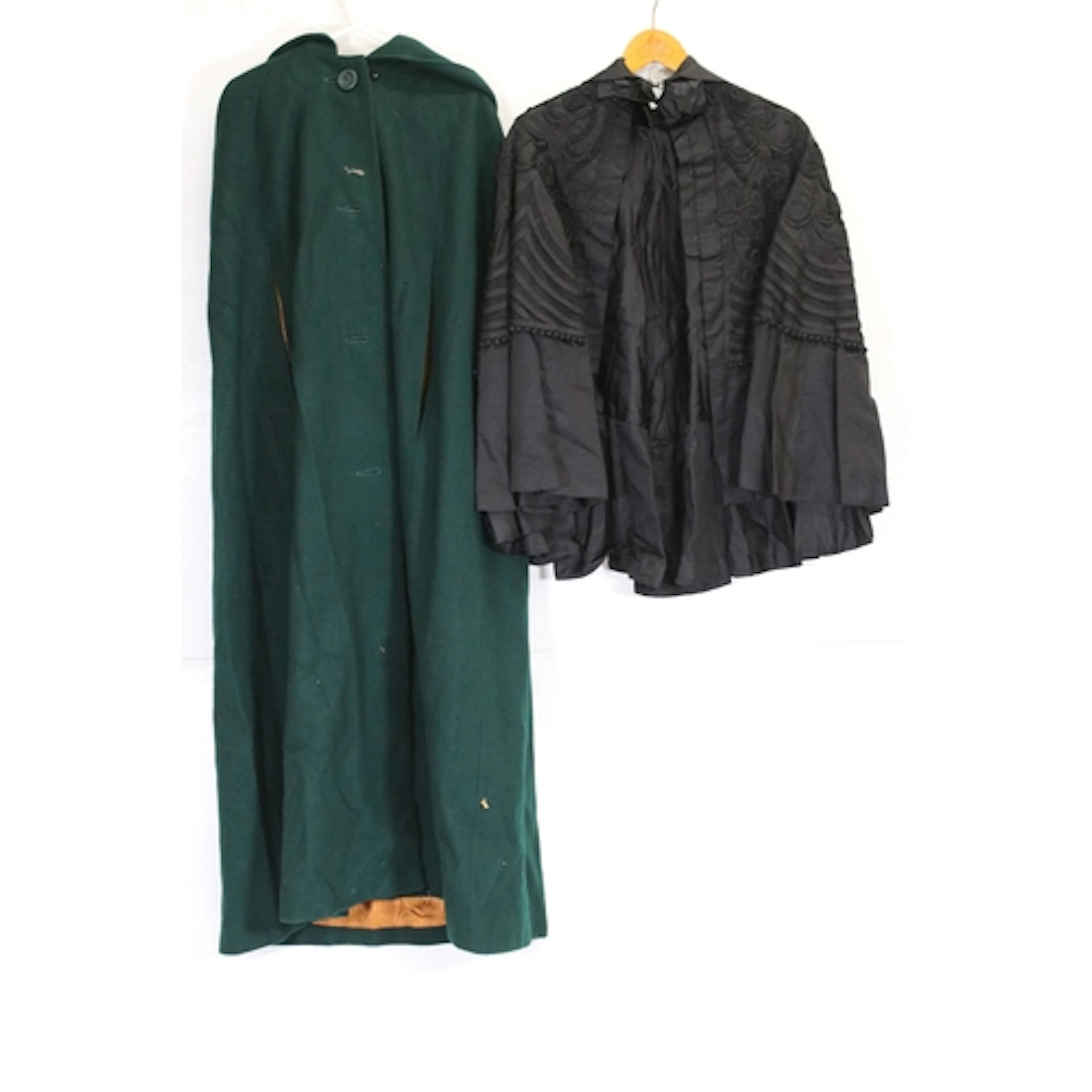 Victorian black cape with embroidered decoration and a mid 2...