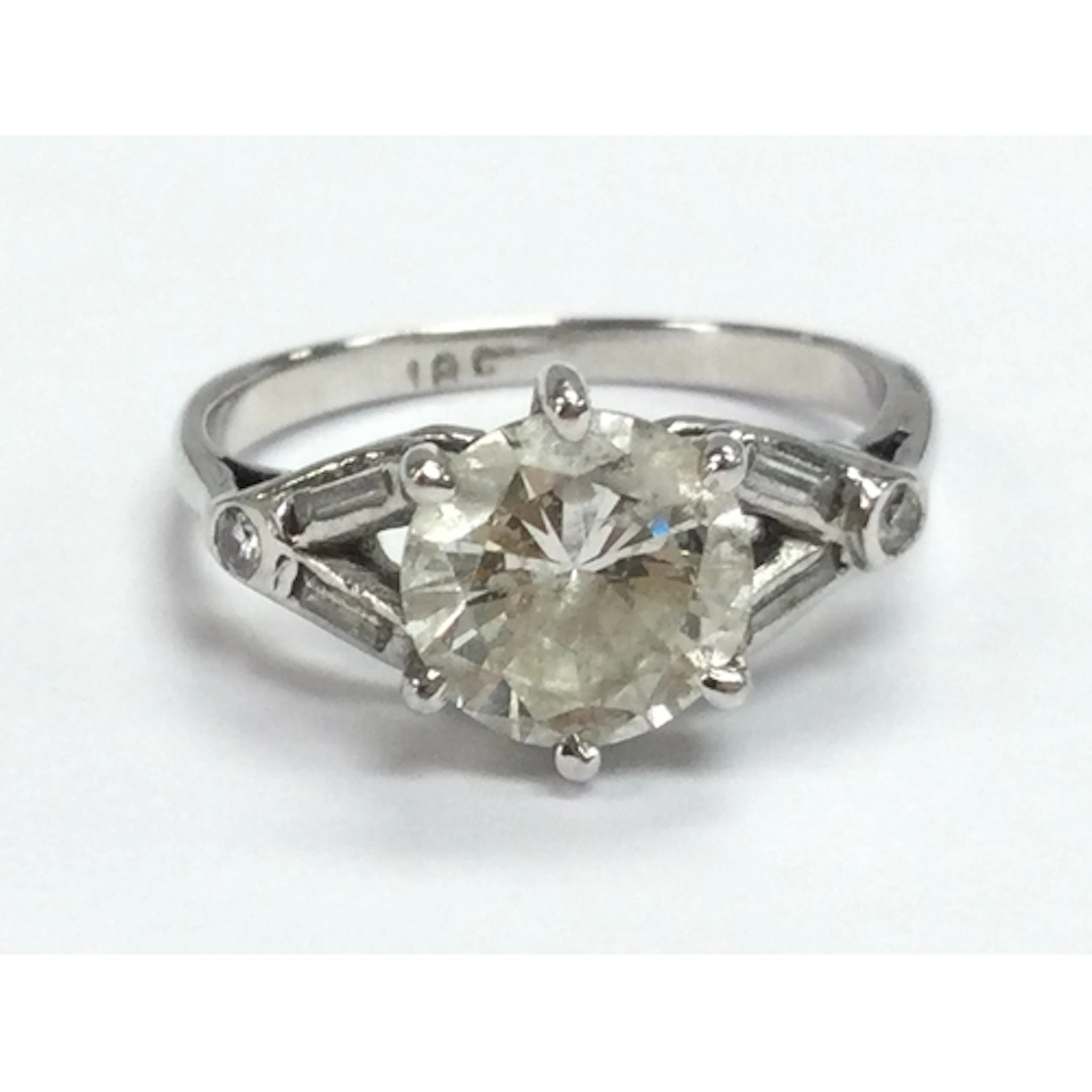 An 18ct white gold diamond solitaire ring, 1.25ct stone. Siz...