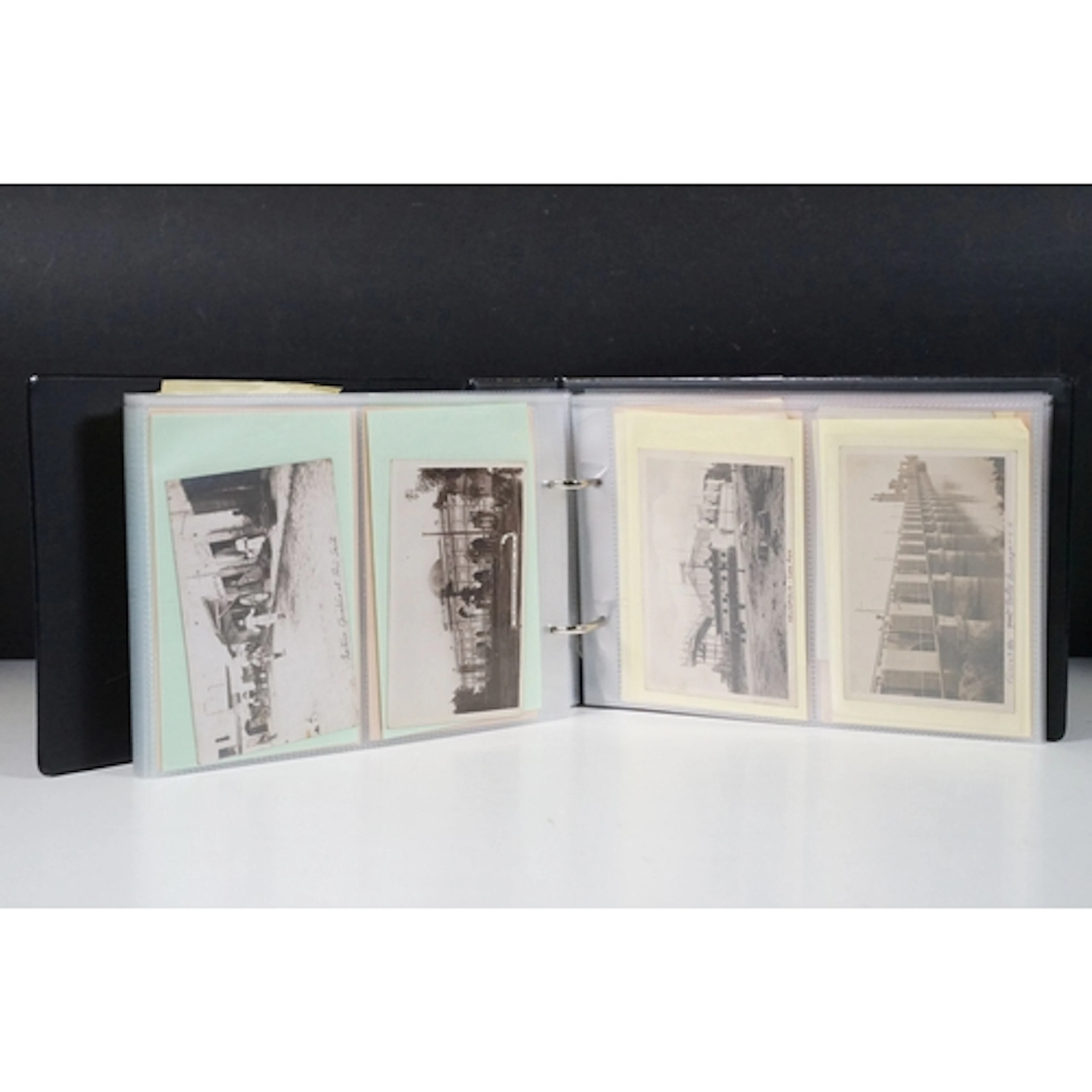 A postcard album containing Ethnic, Native, South Africa, Ad...