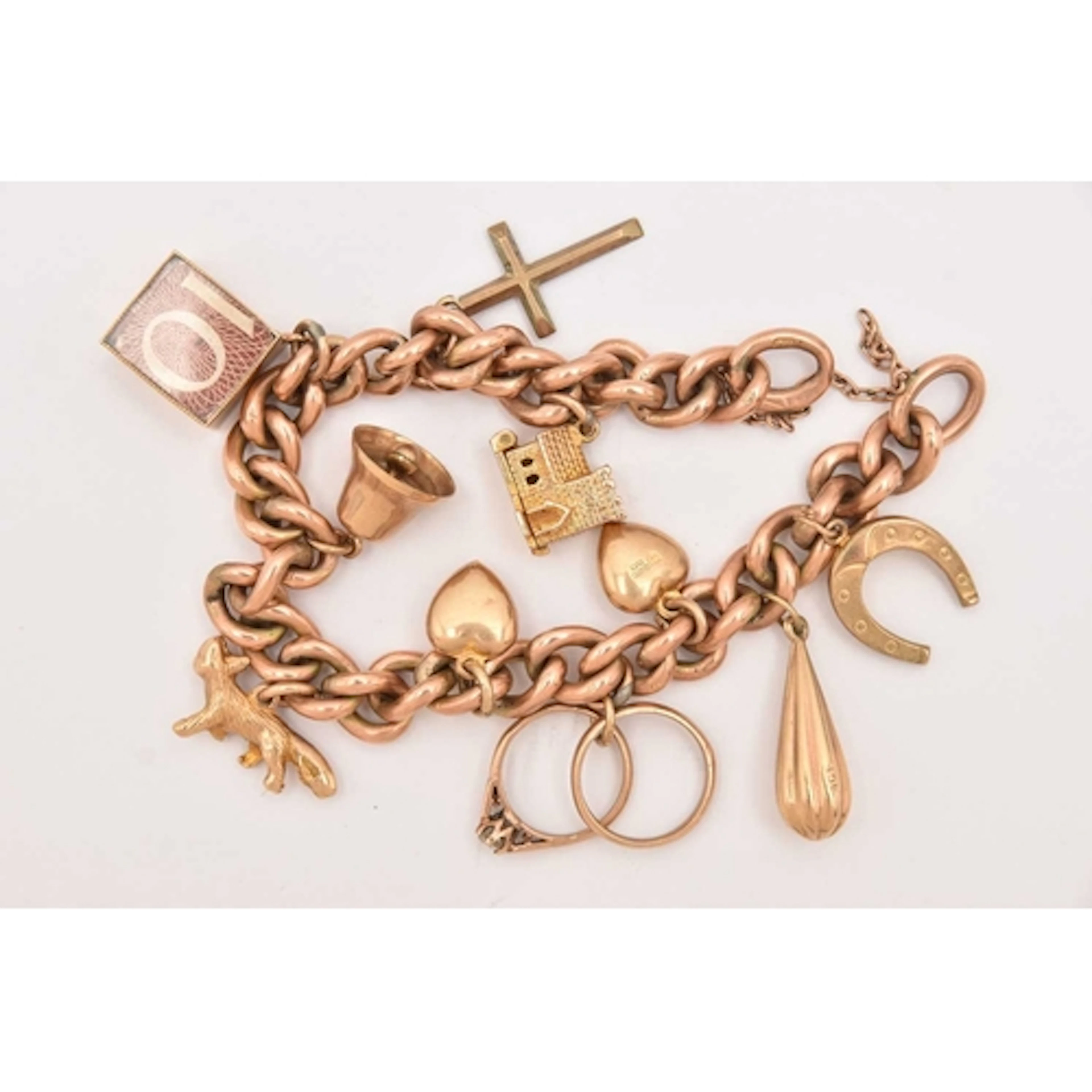A ROSE METAL CURB LINK CHARM BRACELET, hollow curb link brac...