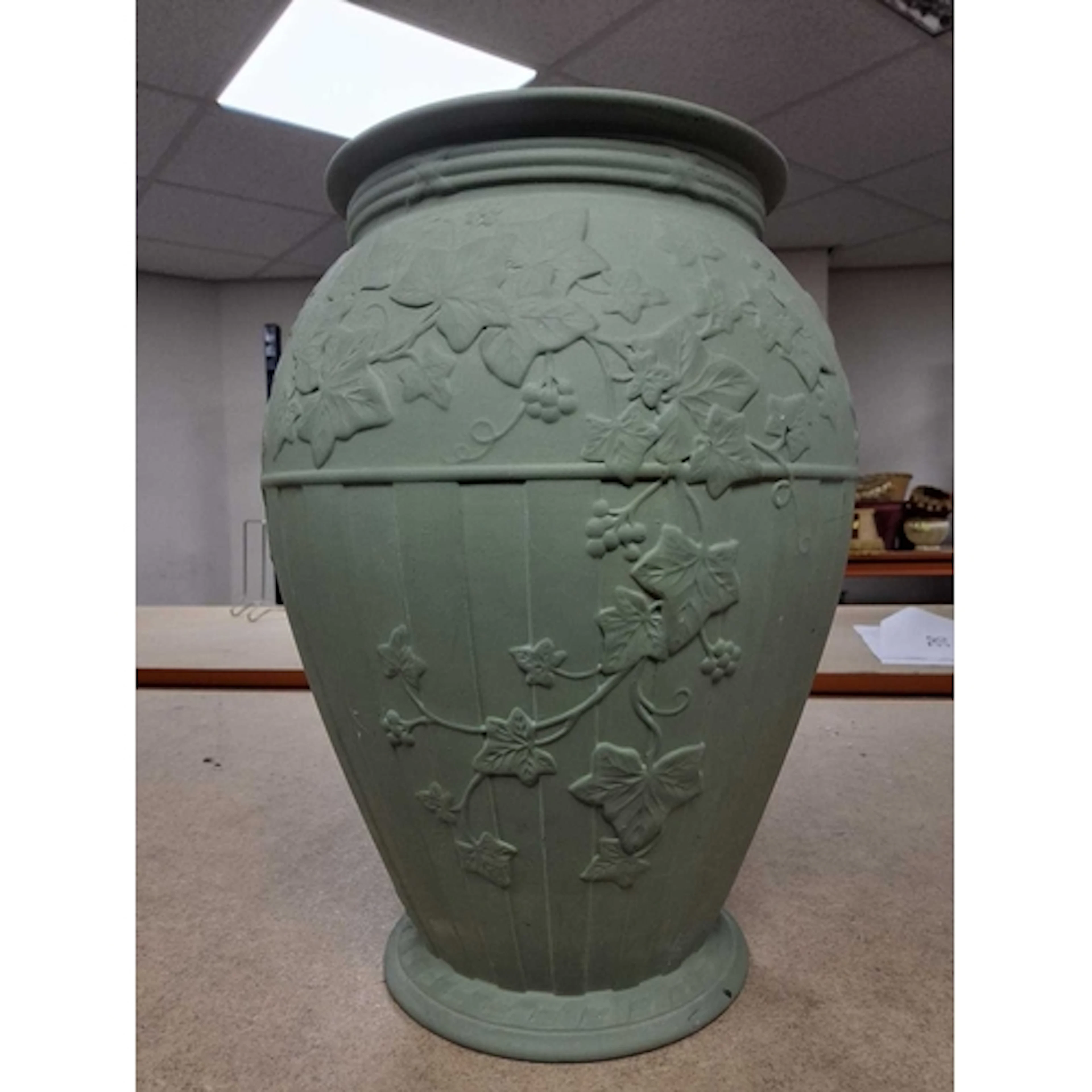 A WEDGWOOD JASPERWARE DORIC IVY VASE, in sage green, the bal...