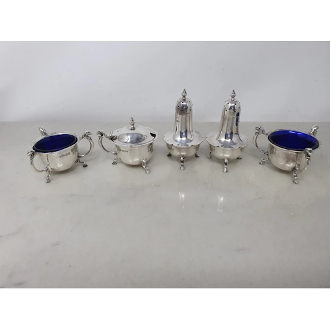 A George V silver five piece Condiment Set, Sheffield 1928, ...