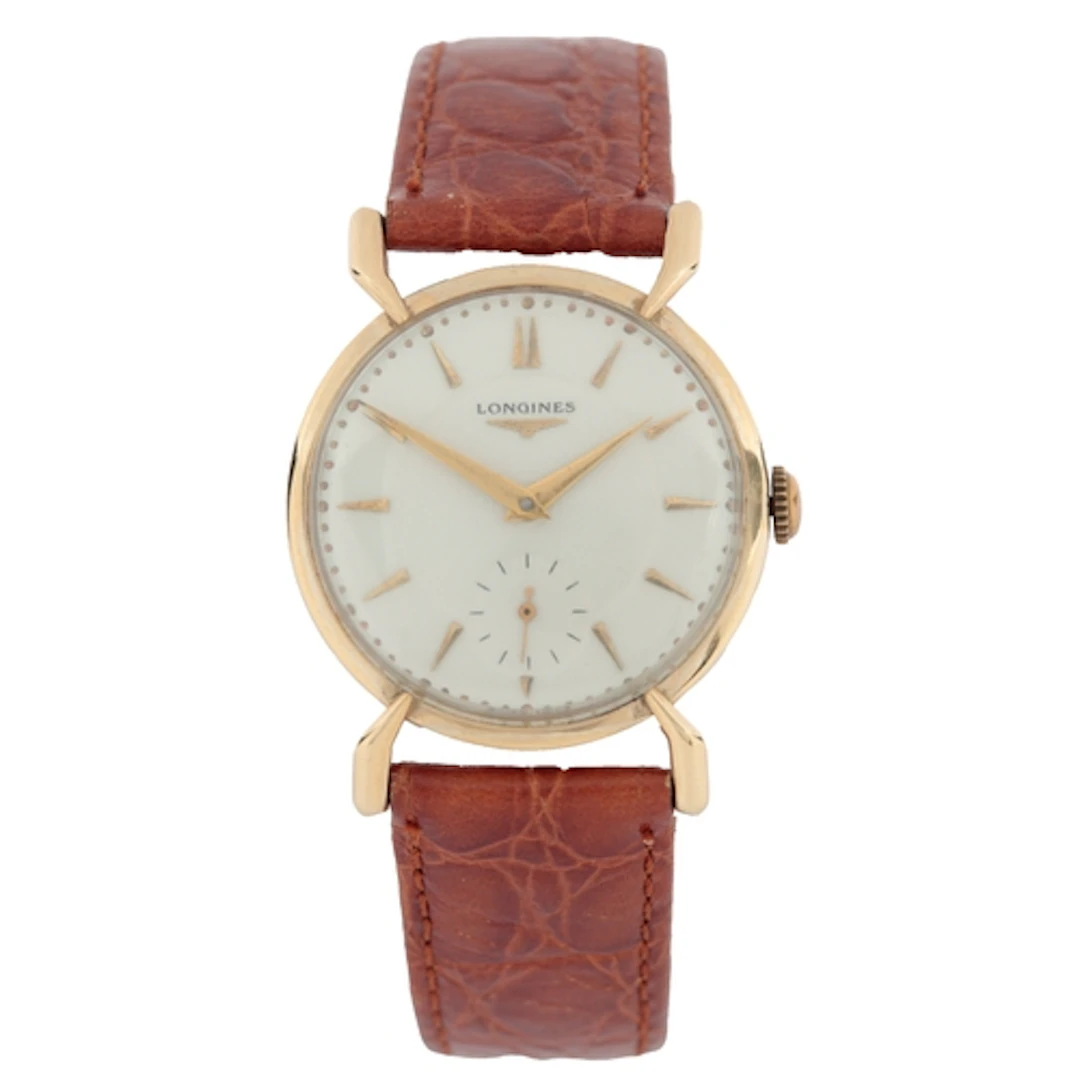 A lady's 14k Longines manual wind wrist watch, with baton nu...