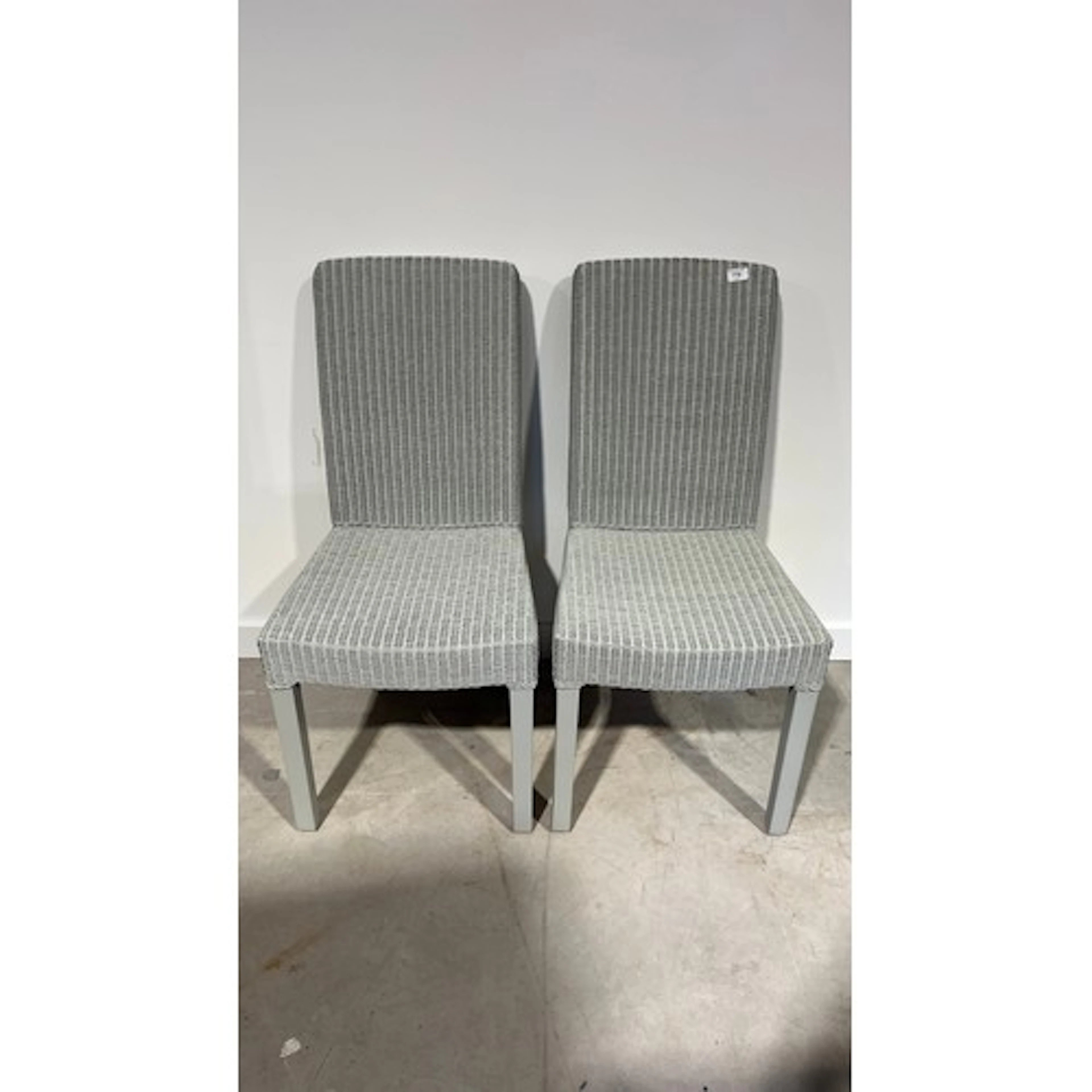 Pair of Llyod loom style chairs by Neptune