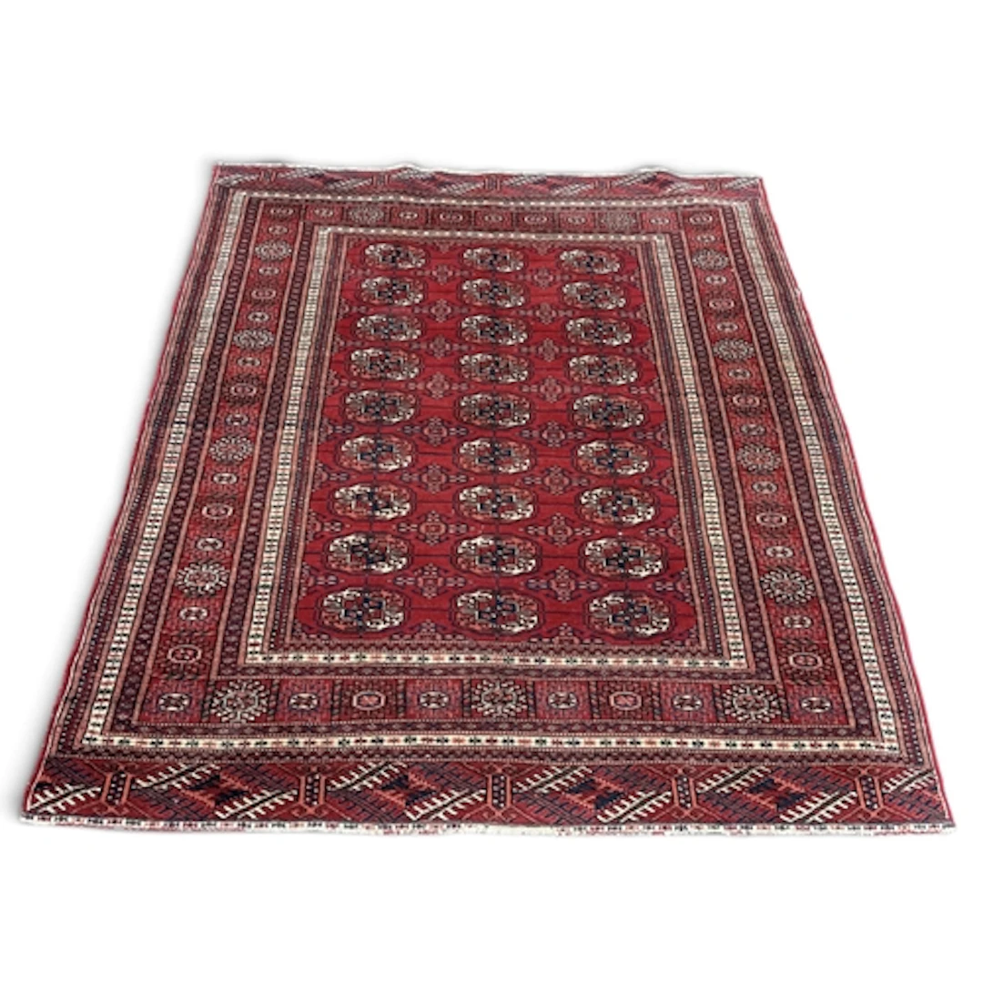 A PERSIAN CARPET 146cm x 123cm