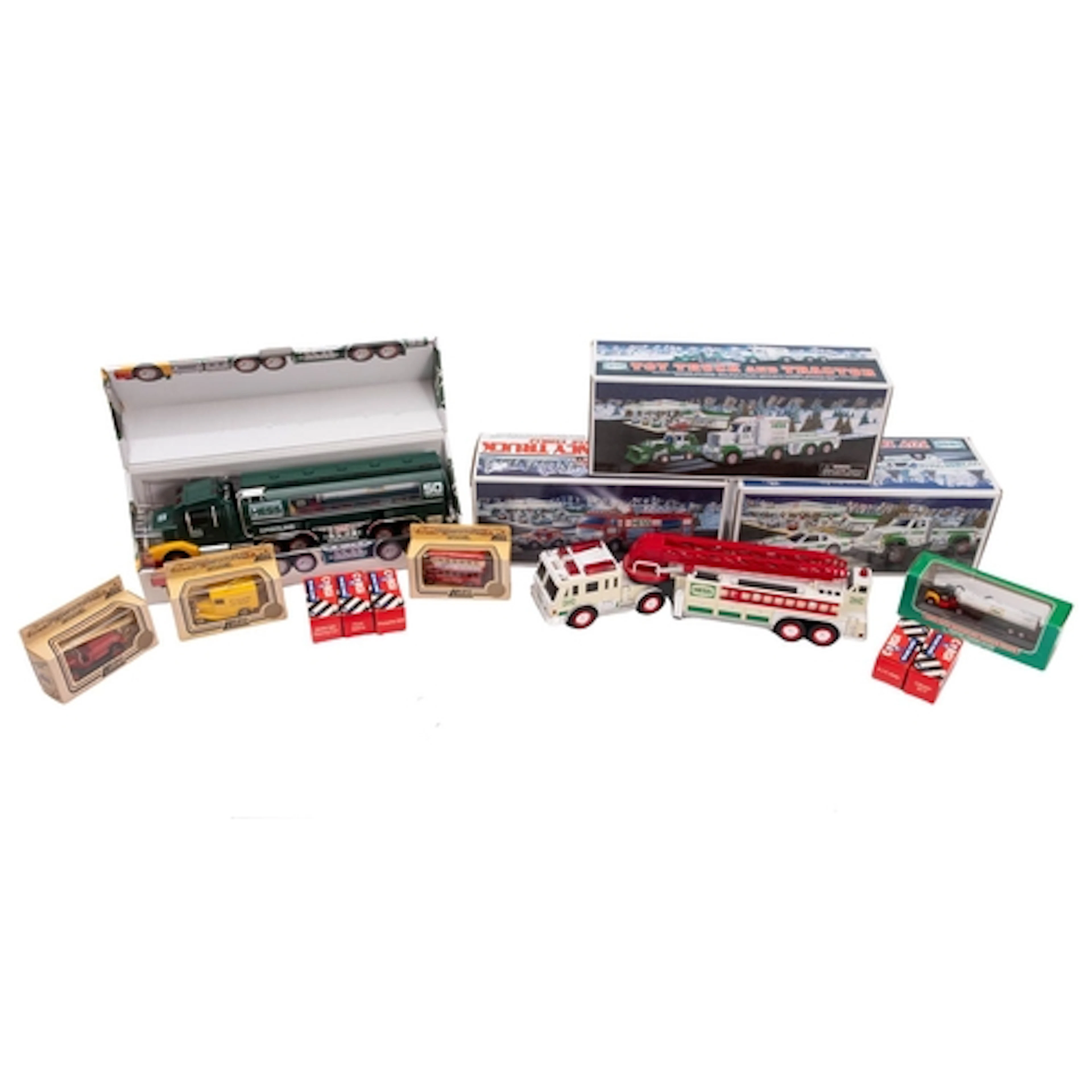 Five Hess diecast vehicle sets. Including toy truck and race...