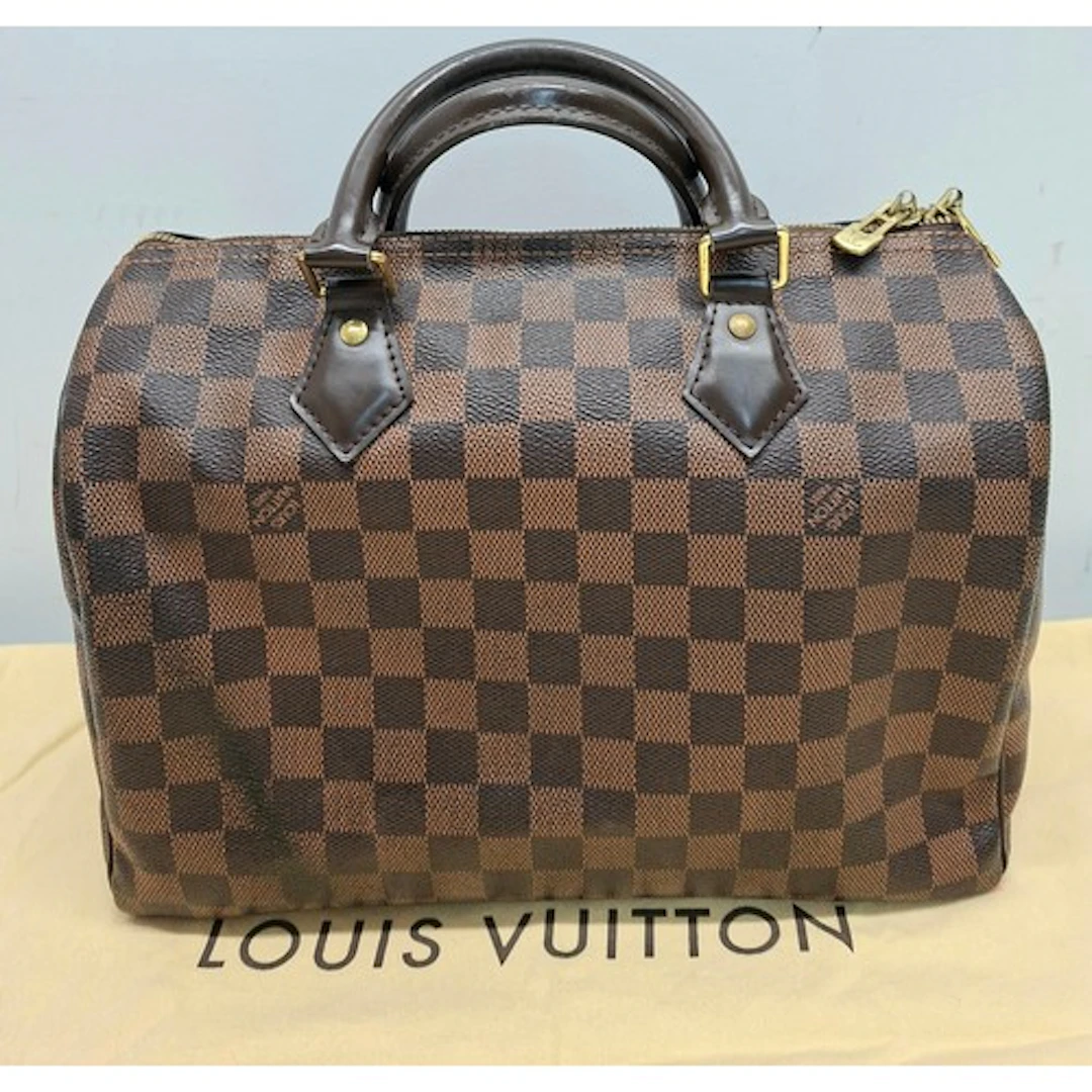 Louis Vuitton- A 2015 Speedy 30 handbag in brown Damier Eben...