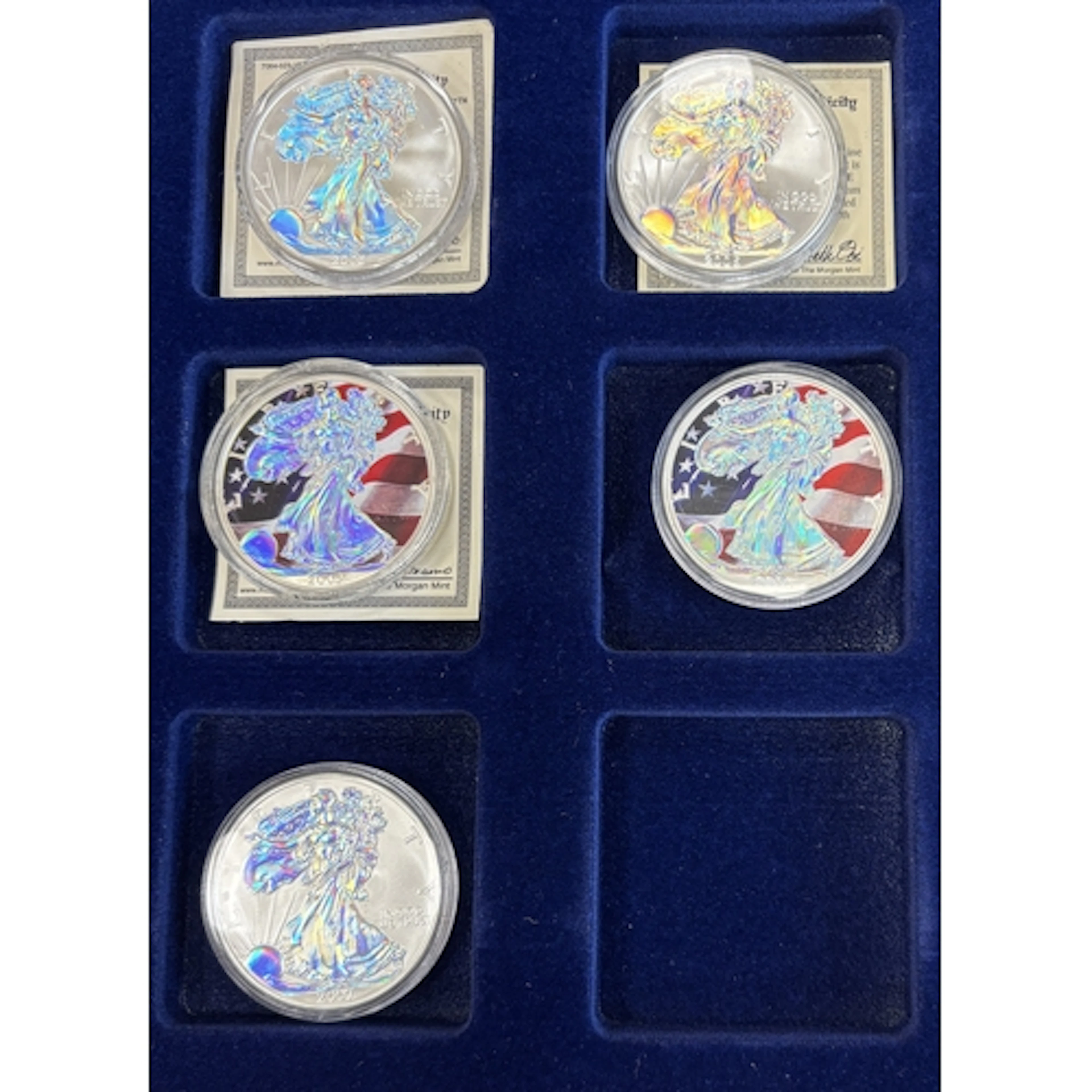 USA. Range of uncirculated Walking Liberty silver dollars, i...