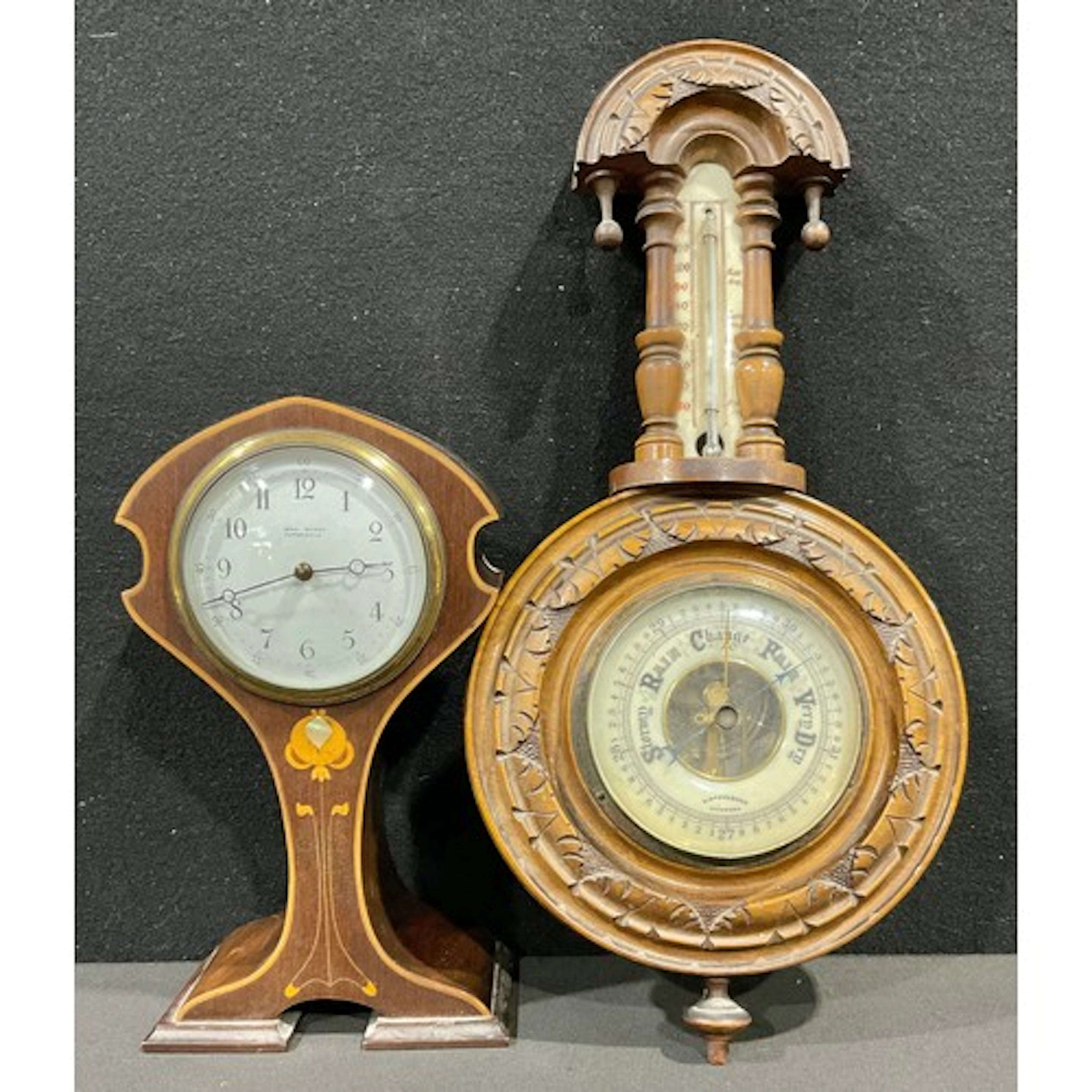 An Edwardian Art Nouveau inlaid mahogany mantel clock time p...