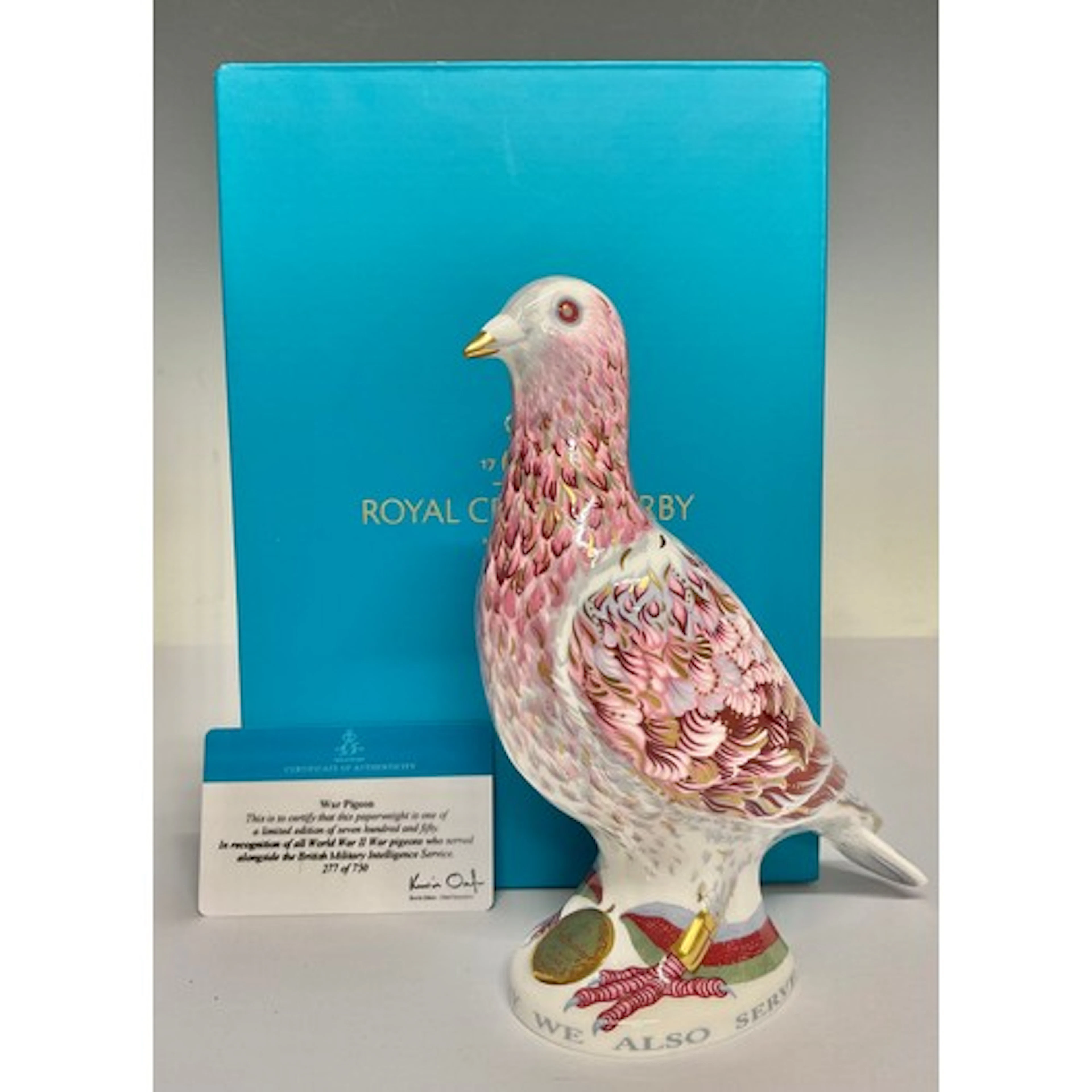 A Royal Crown Derby paperweight, War Pigeon, in recognition ...