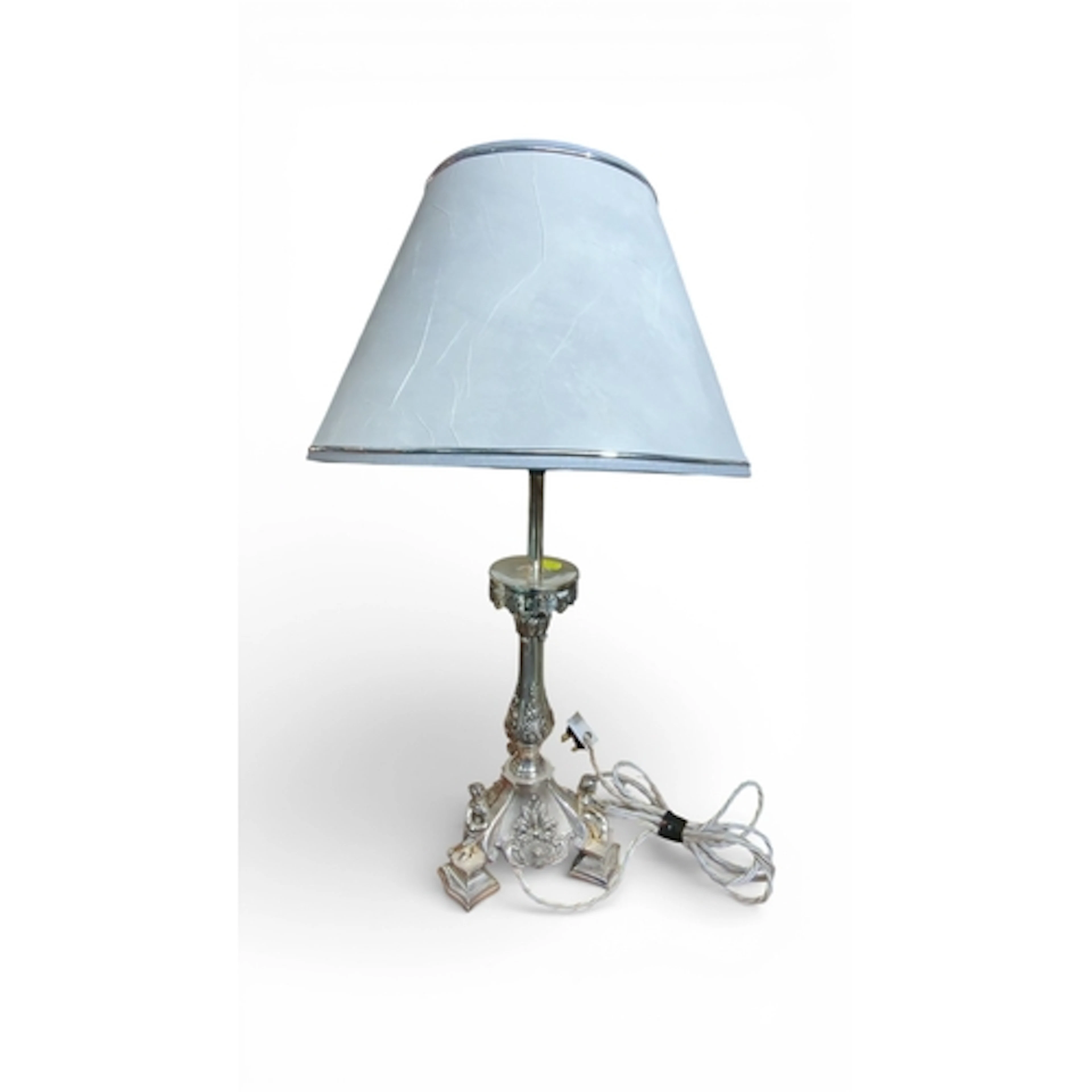 A silver-coloured metal table lamp with flared shade, the co...