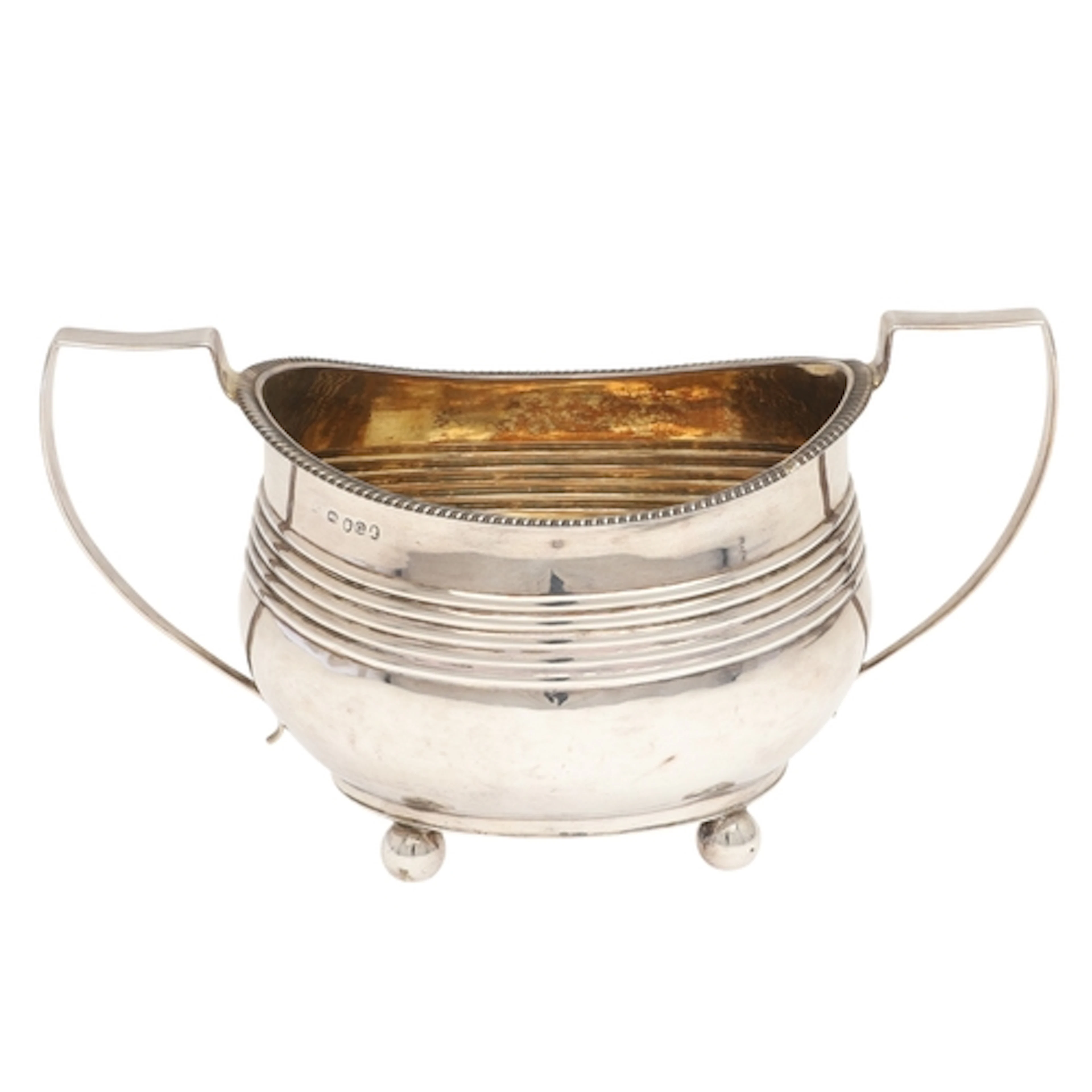 A GEORGE III SILVER SUGAR BASIN. With twin handles and gilde...