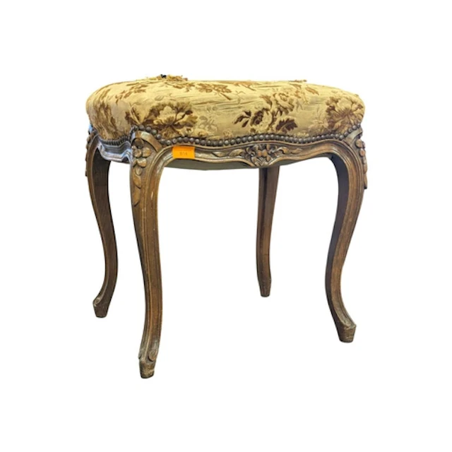 A Louis Cannes French rococo footstool. Of beech wood constr...