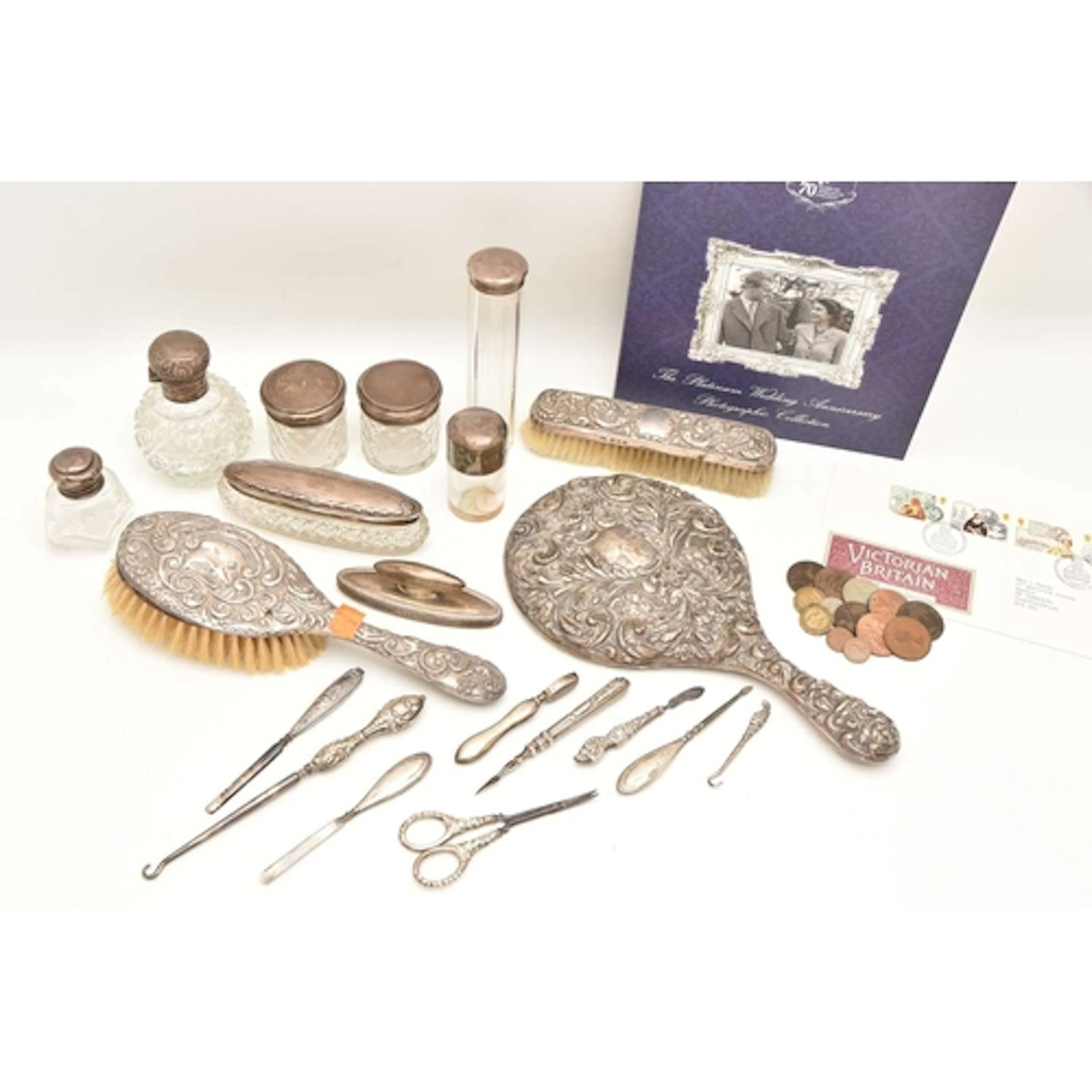 A GROUP OF SILVER ITEMS, to include six cut glass jars/scent...