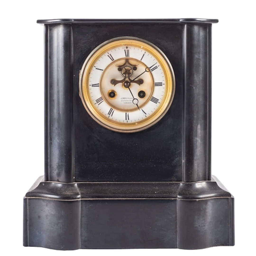 J.W. Benson, a late-Victorian French black marble mantel clo...