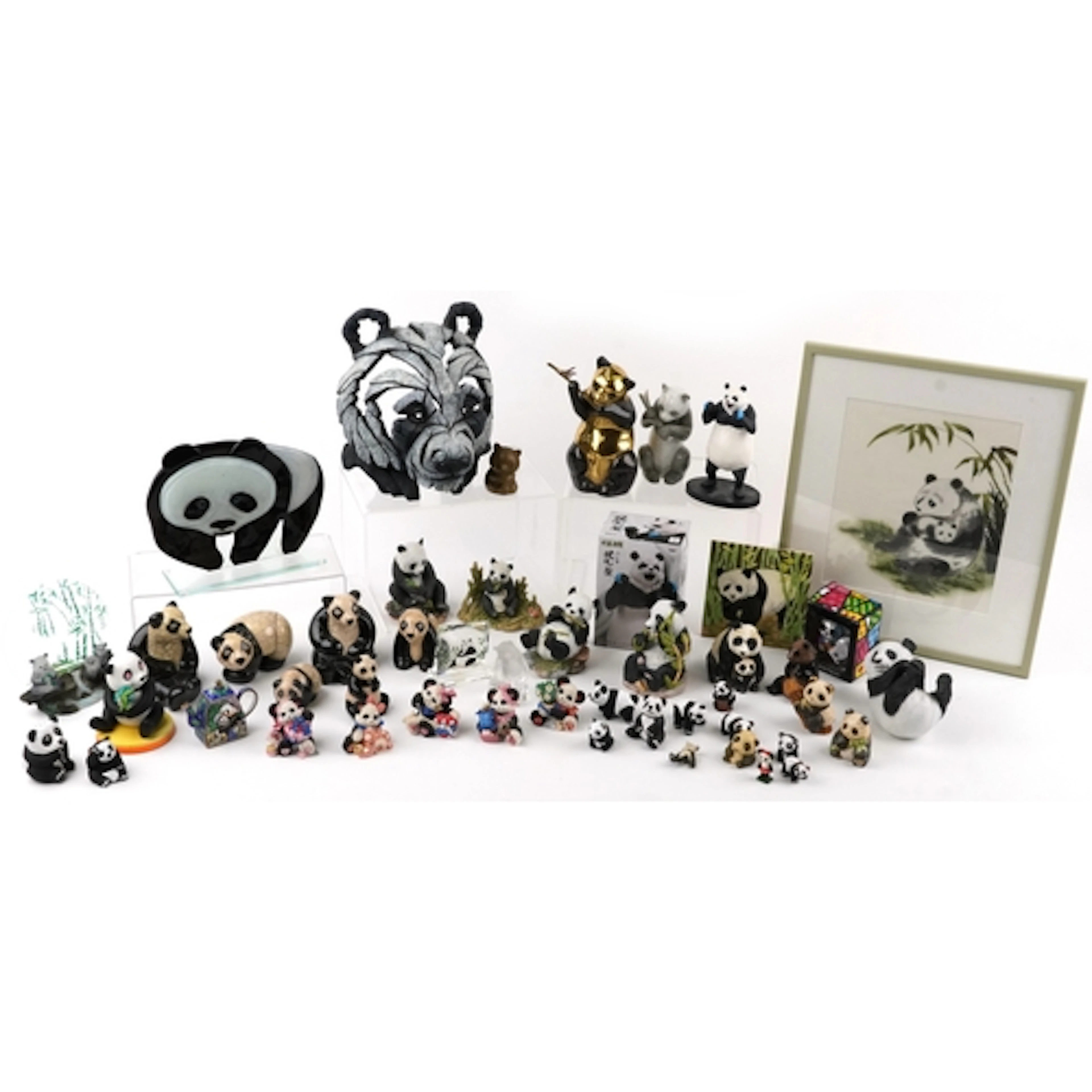 Large collection of decorative panda figures including potte...