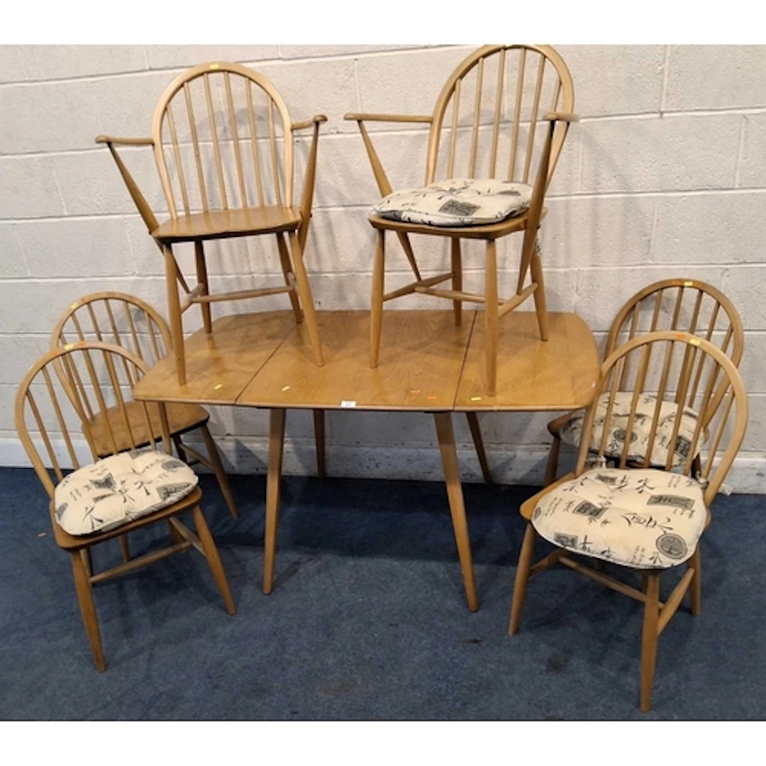 LUCIAN ERCOLANI, AN MID-CENTURY ERCOL ELM AND BEECH MODEL 38...