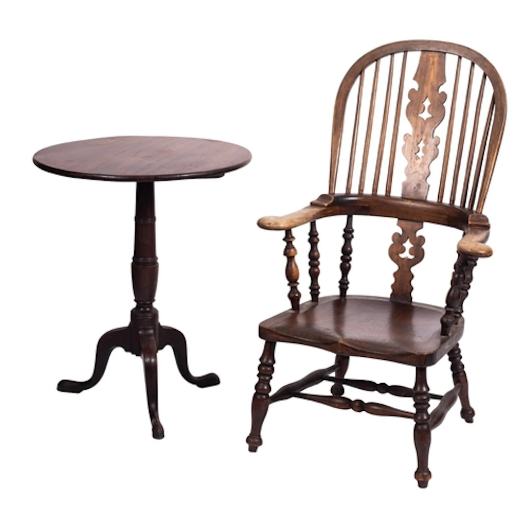 An elm, ash and yew elbow chair in the manner of a Windsor, ...