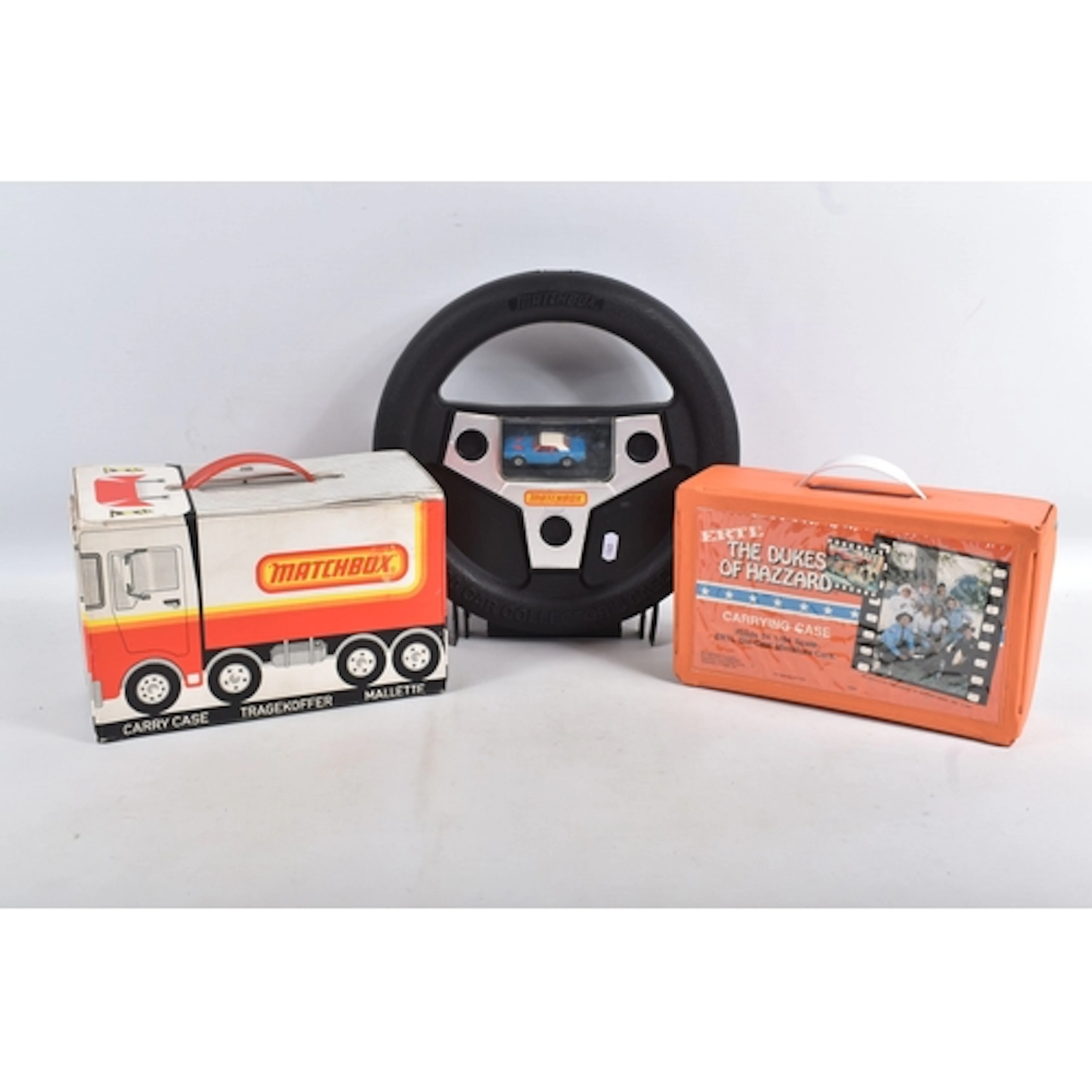 THREE CARRY CASES WITH COLLECTABLE MATCHBOX CARS, to include...