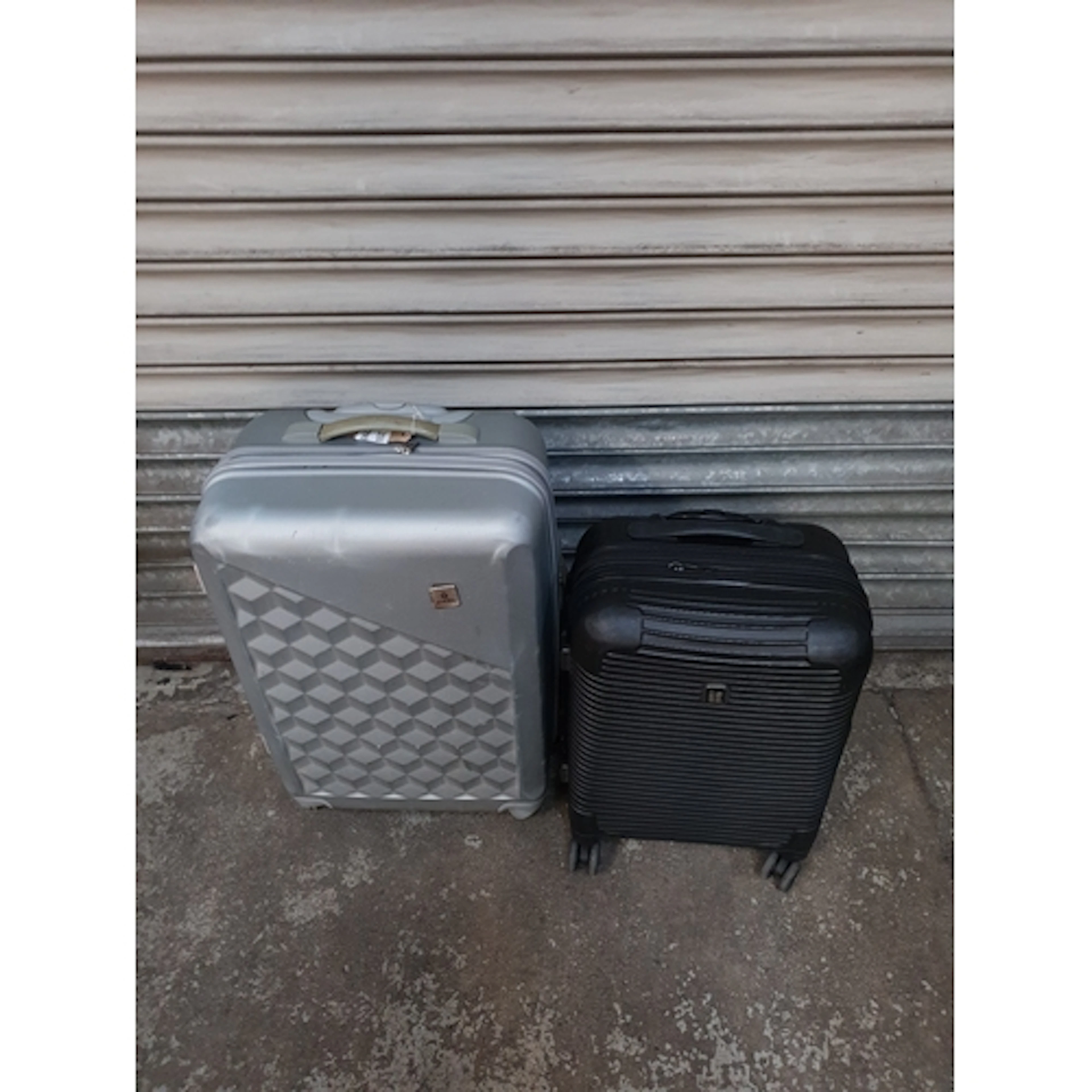 TWO SUITCASES comprising Zifel and IT Note: cases and bags a...