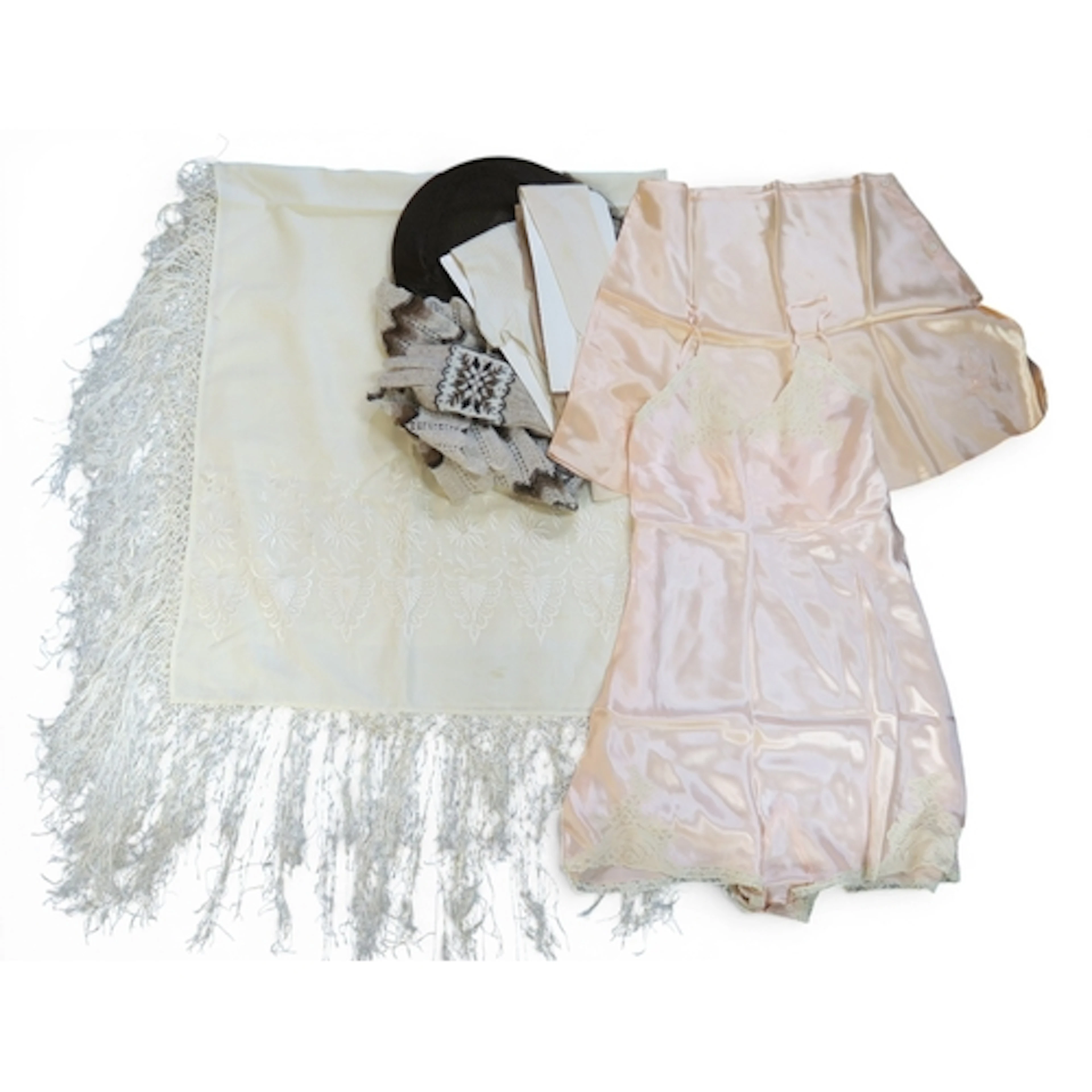 A cream embroidered piano shawl, vintage silk nightwear, sto...
