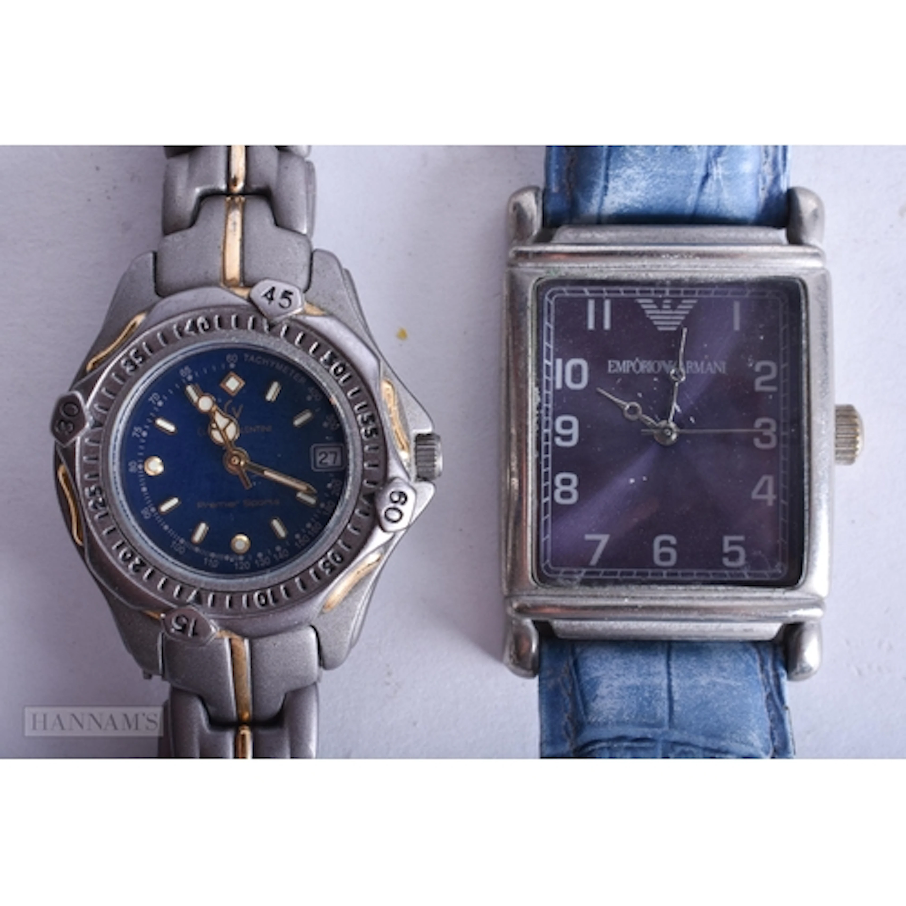 AN ARMANI WRIST WATCH together with another. Untested. 3.25 ...