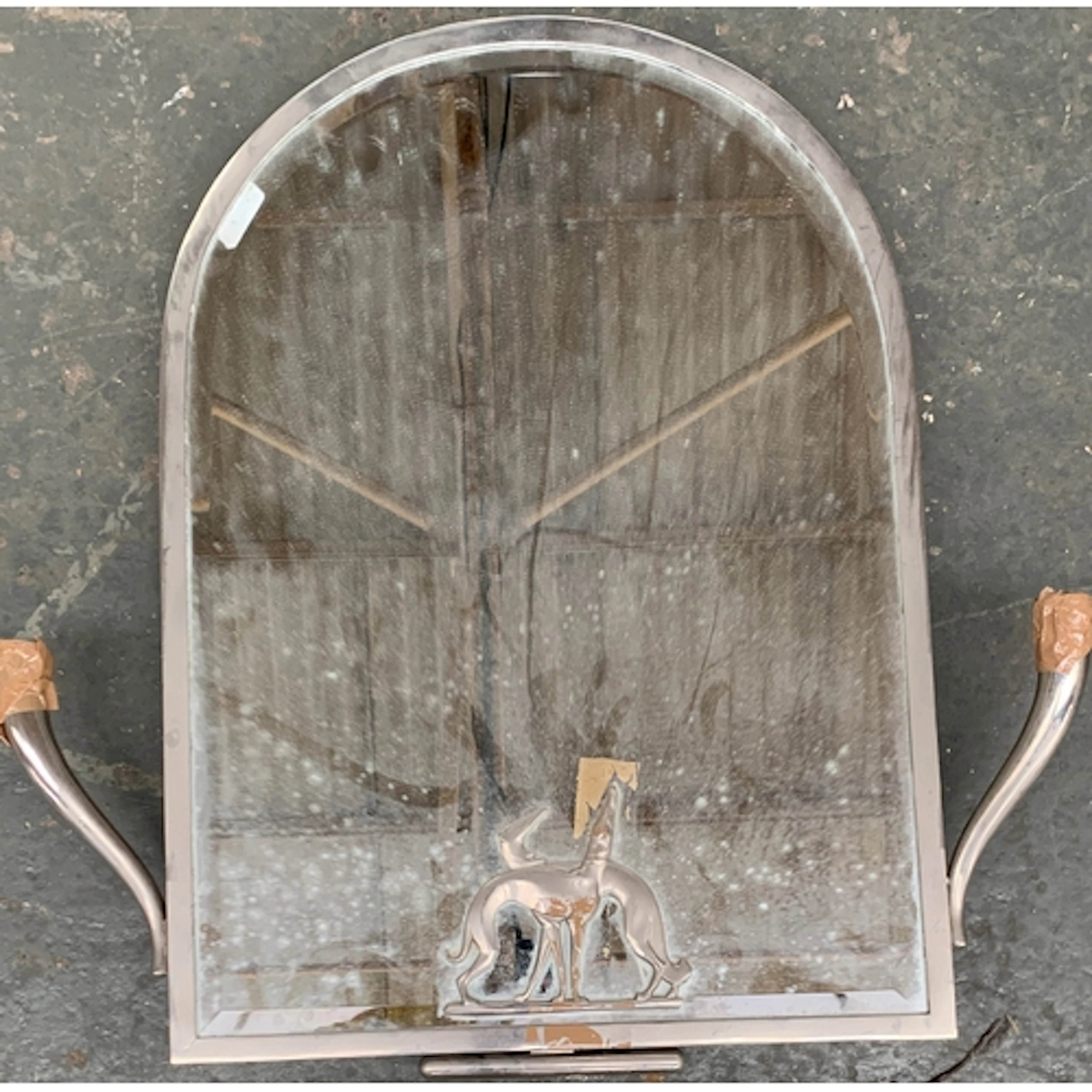 A modern arched dressing table mirror with stand and two sid...
