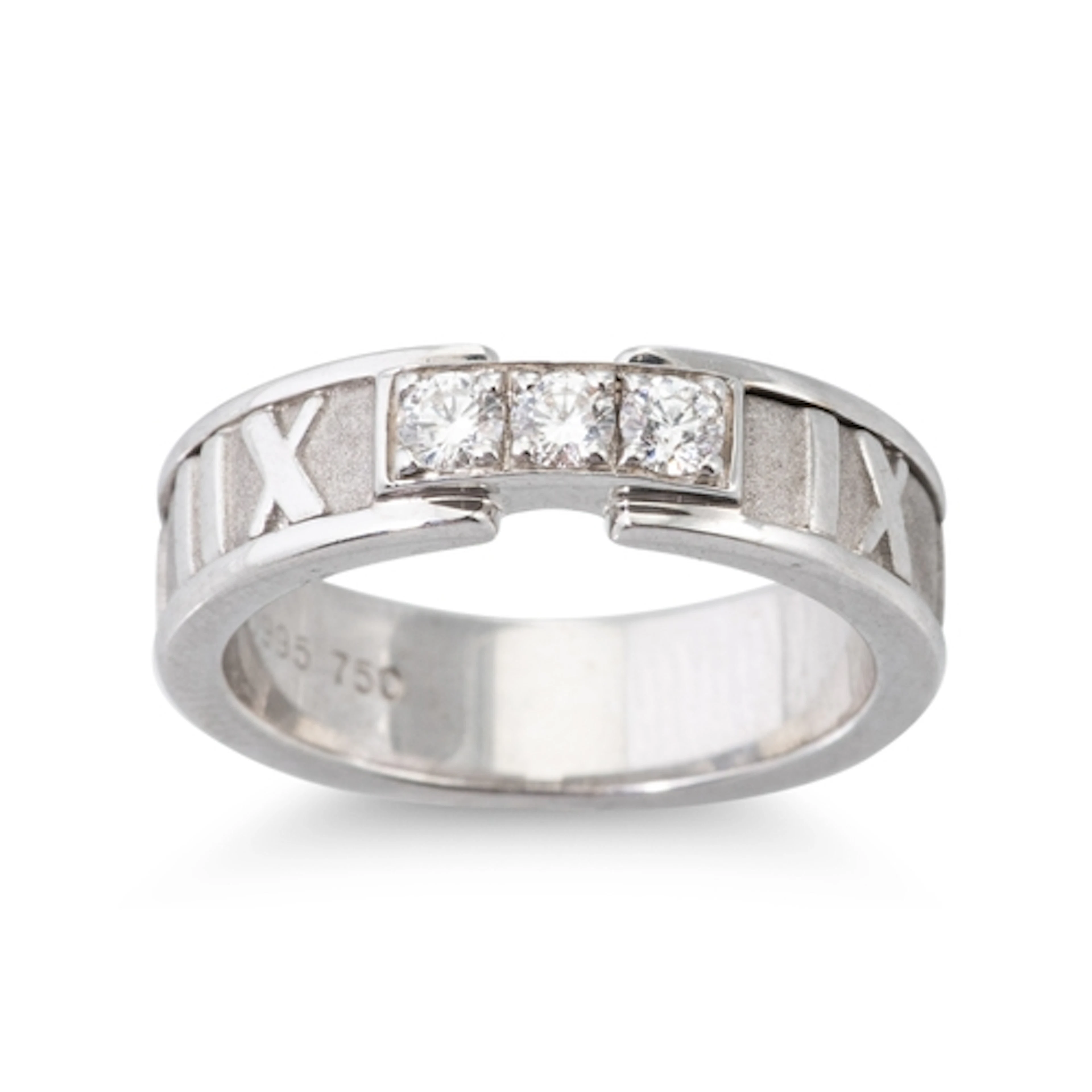 A TIFFANY AND CO. ATLAS RING, set with brilliant cut diamond...