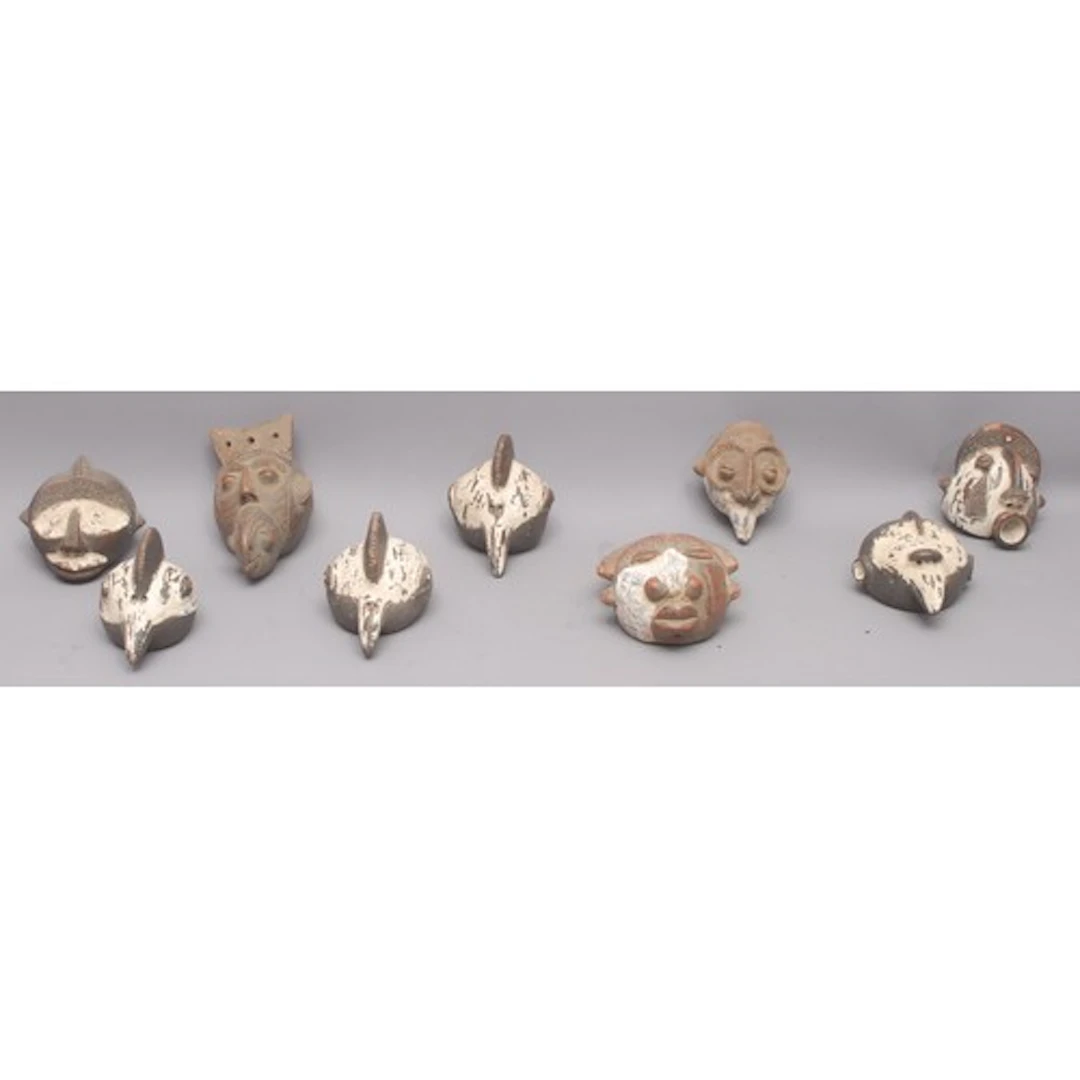 Tribal Art - a collection of nine African Tikar terracotta p...