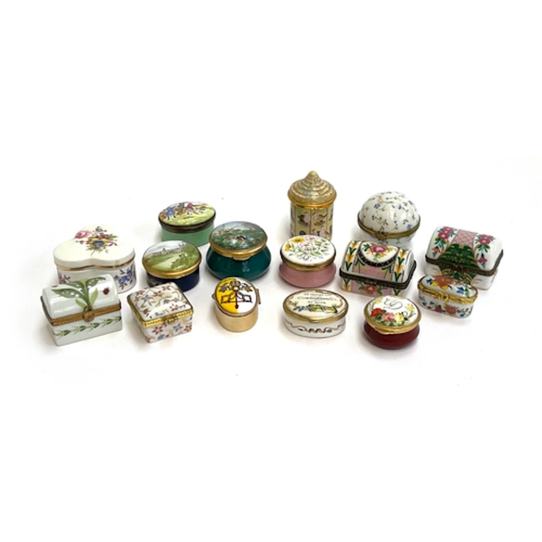 A lot of 15 enamel and porcelain pill boxes to include: Staf...