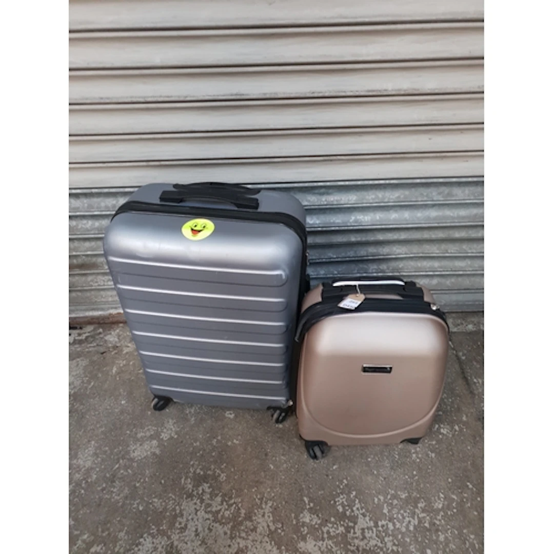TWO SUITCASES including Wings Note: cases and bags are empty