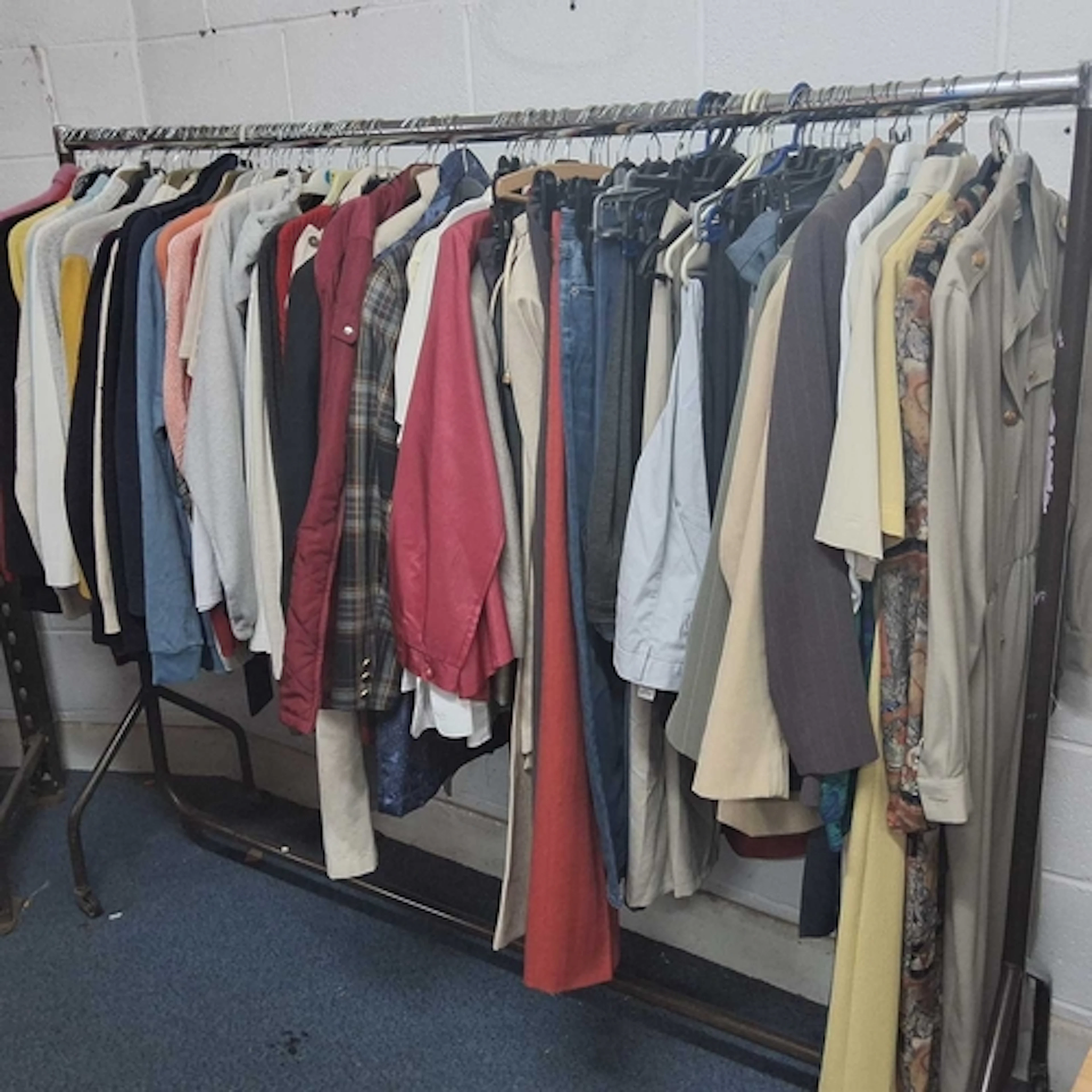 ONE RAIL OF WOMANS CLOTHING, approximately seventy-five item...