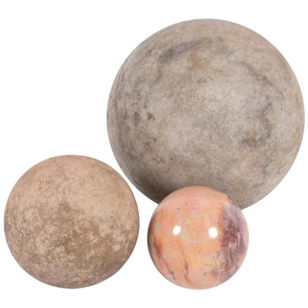 2 turnstone balls, and a polished marble ball, largest 14.5c...
