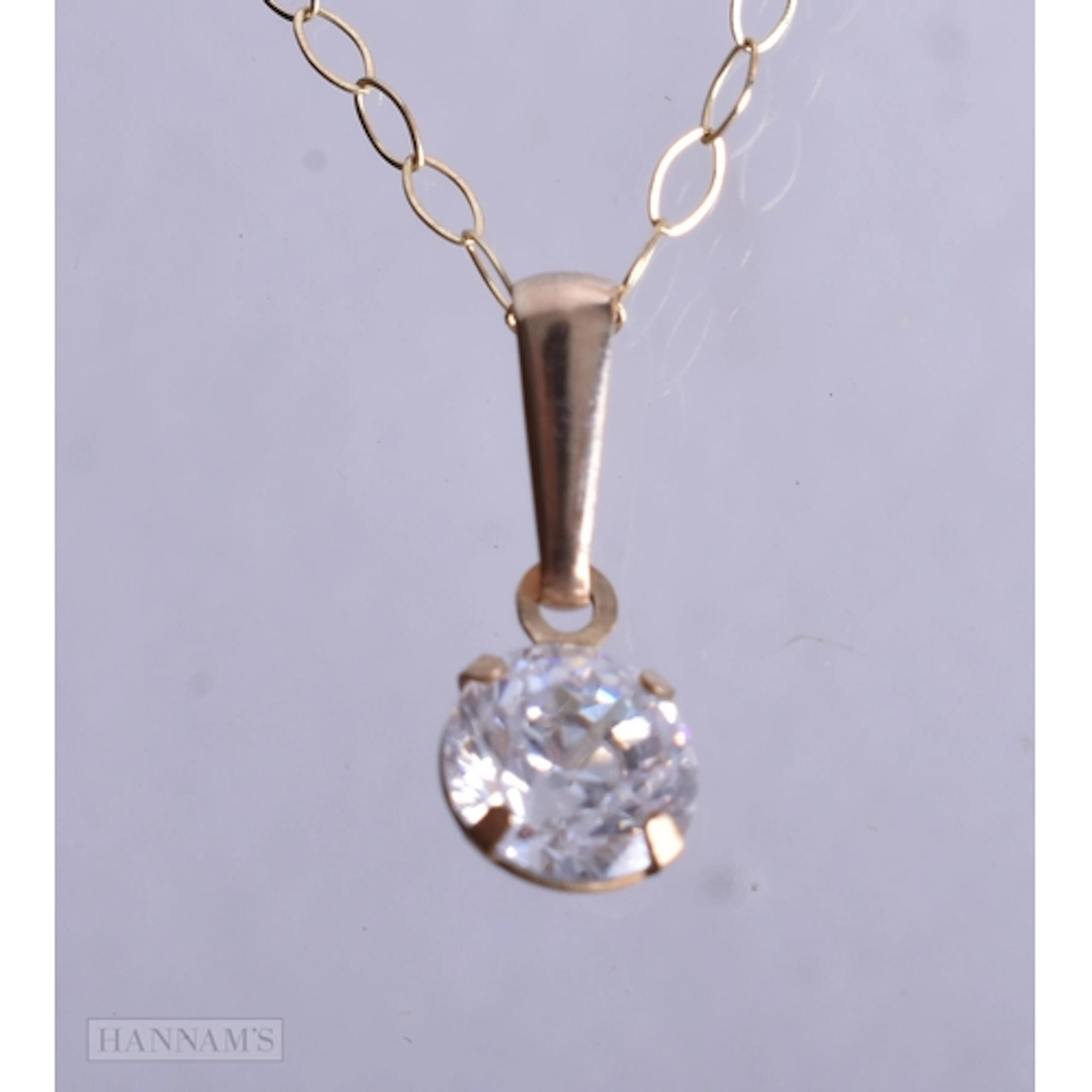 A 9CT GOLD SEM SET NECKLACE. 0.6 grams. 40 cm long.