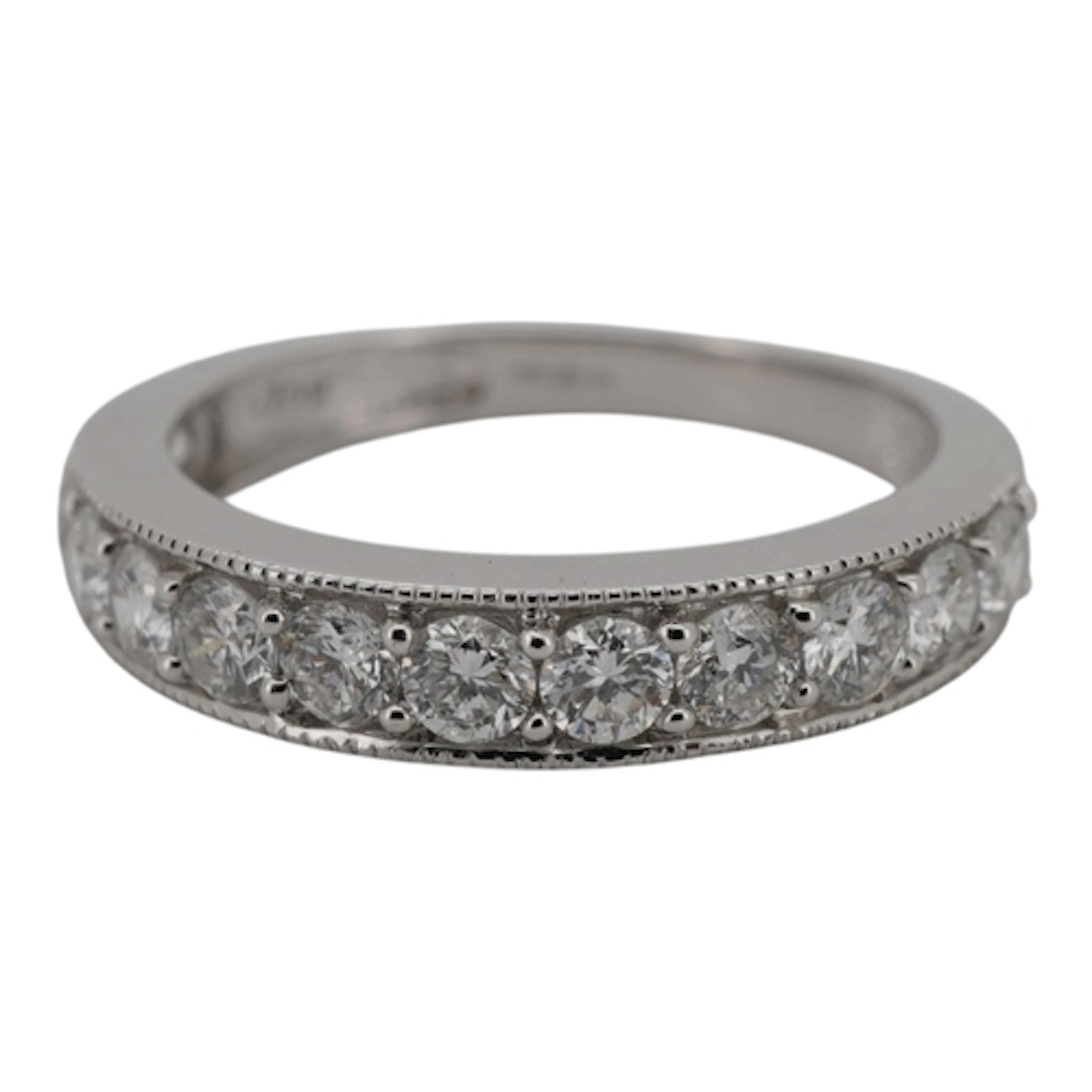 A diamond half eternity ring, set to the front with brillian...