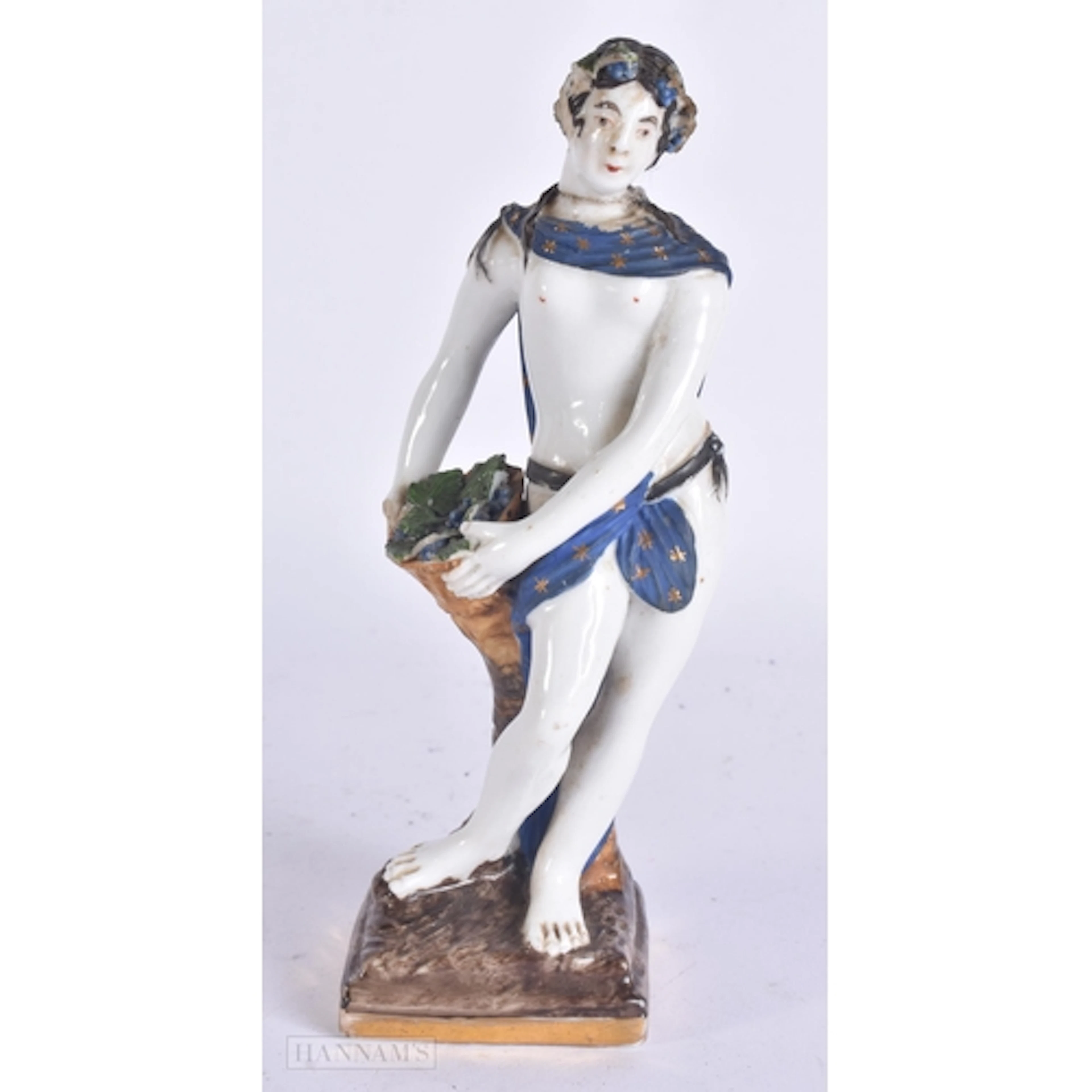 A RARE EARLY 19TH CENTURY RUSSIAN PORCELAIN FIGURE modelled ...