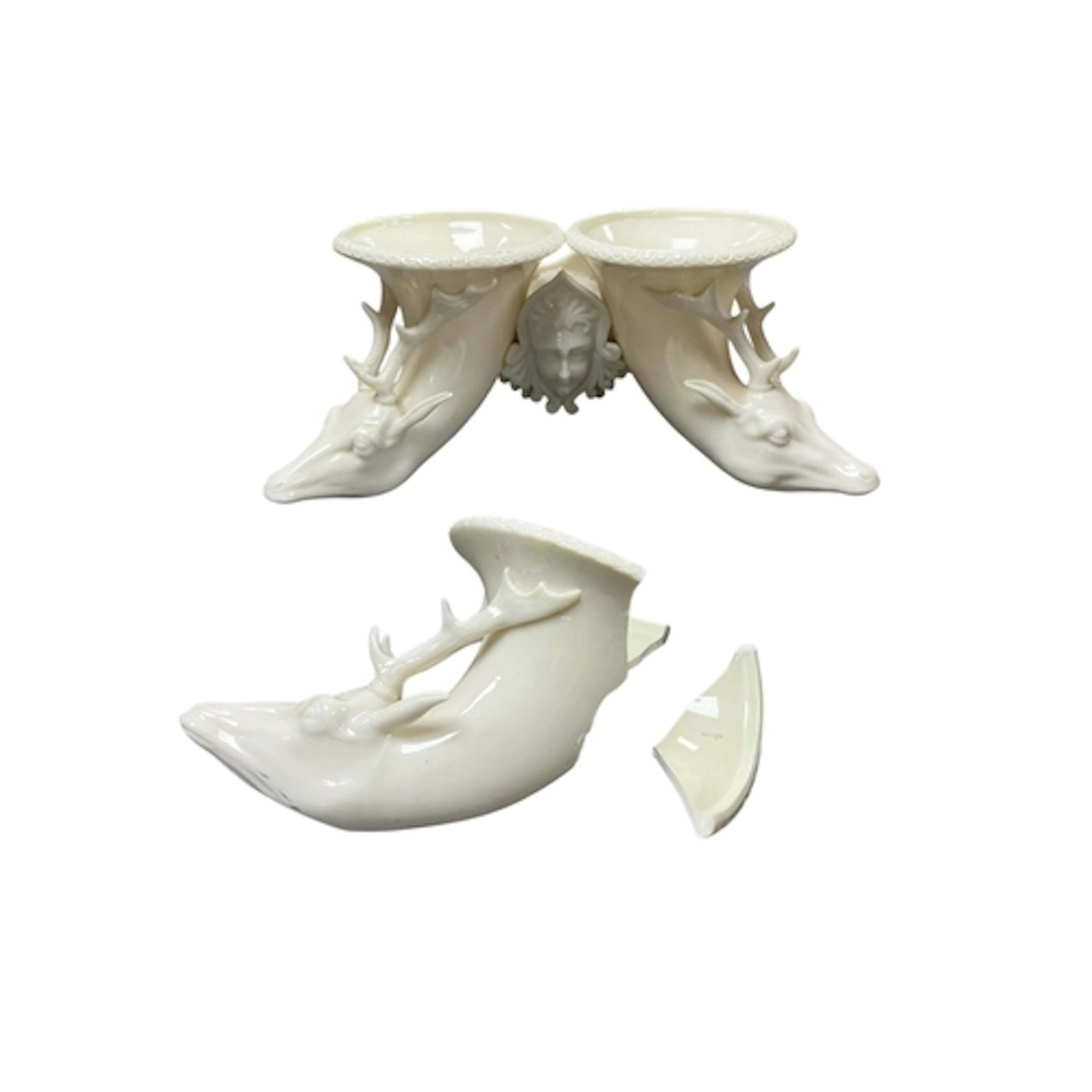 A Royal Worcester stags head triple cornucopia vase, a/f, 10...