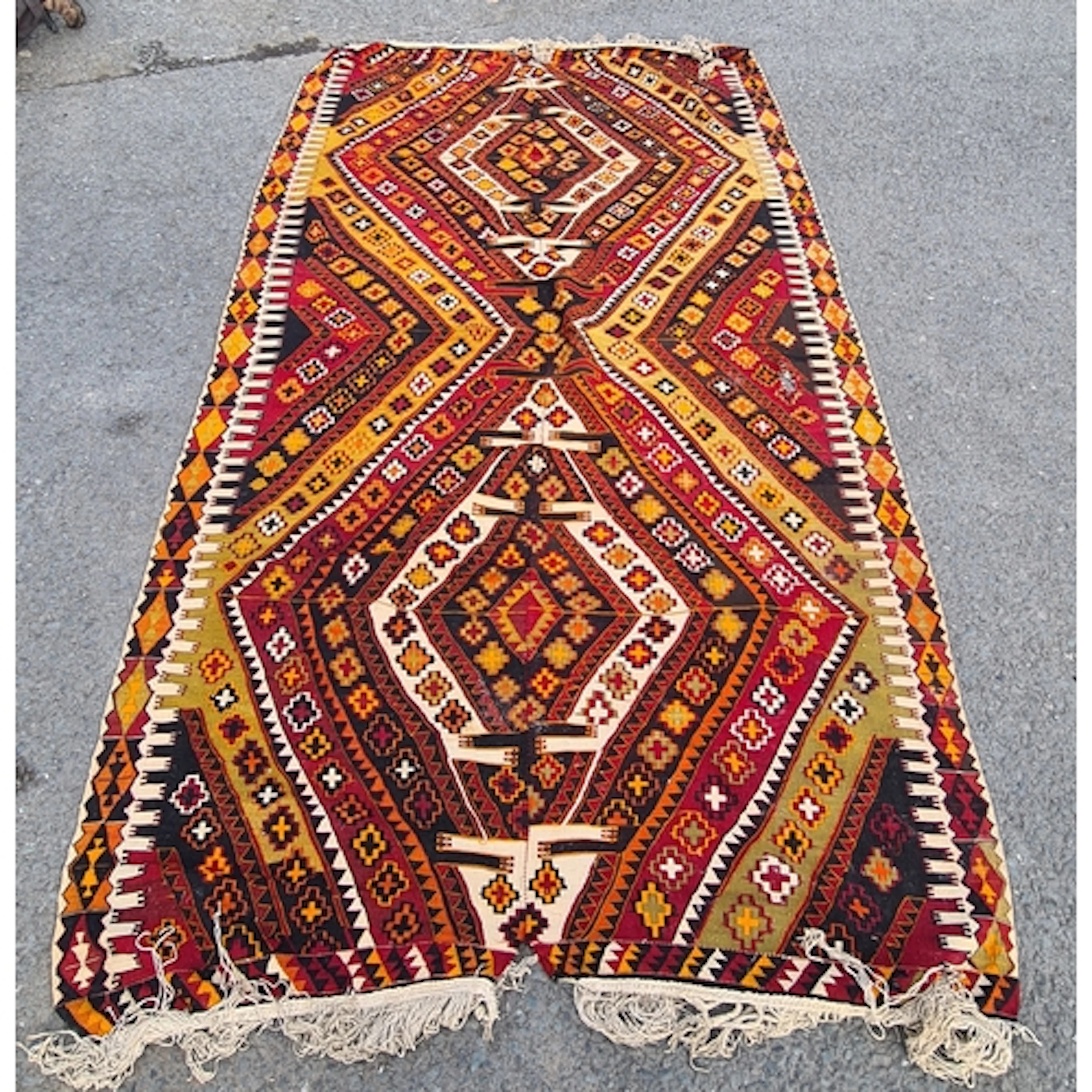 An Afghan wool Kelim, having brightly coloured geometric des...
