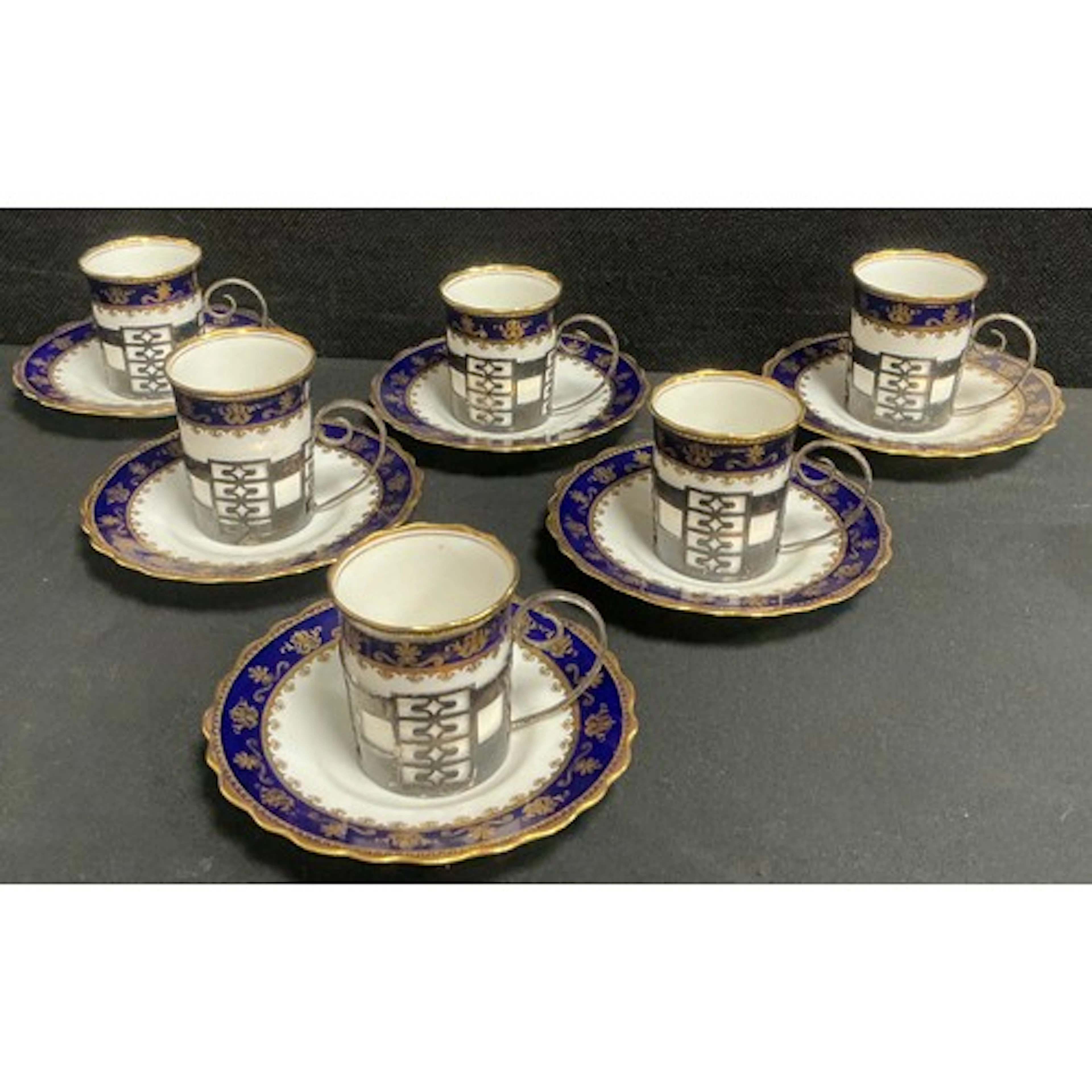 An early 20th century set of six silver mounted Aynsley coff...