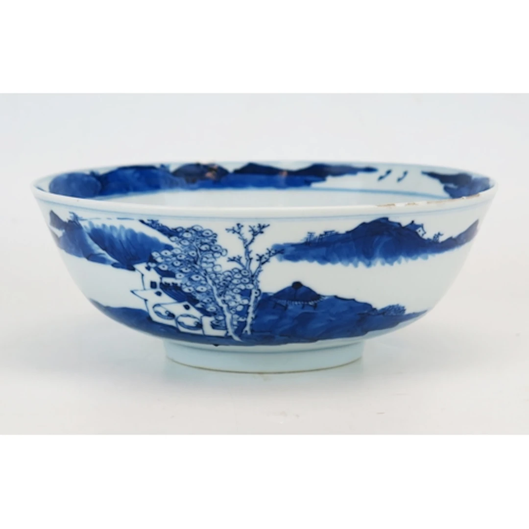 A late 19th century Chinese blue and white porcelain bowl wi...