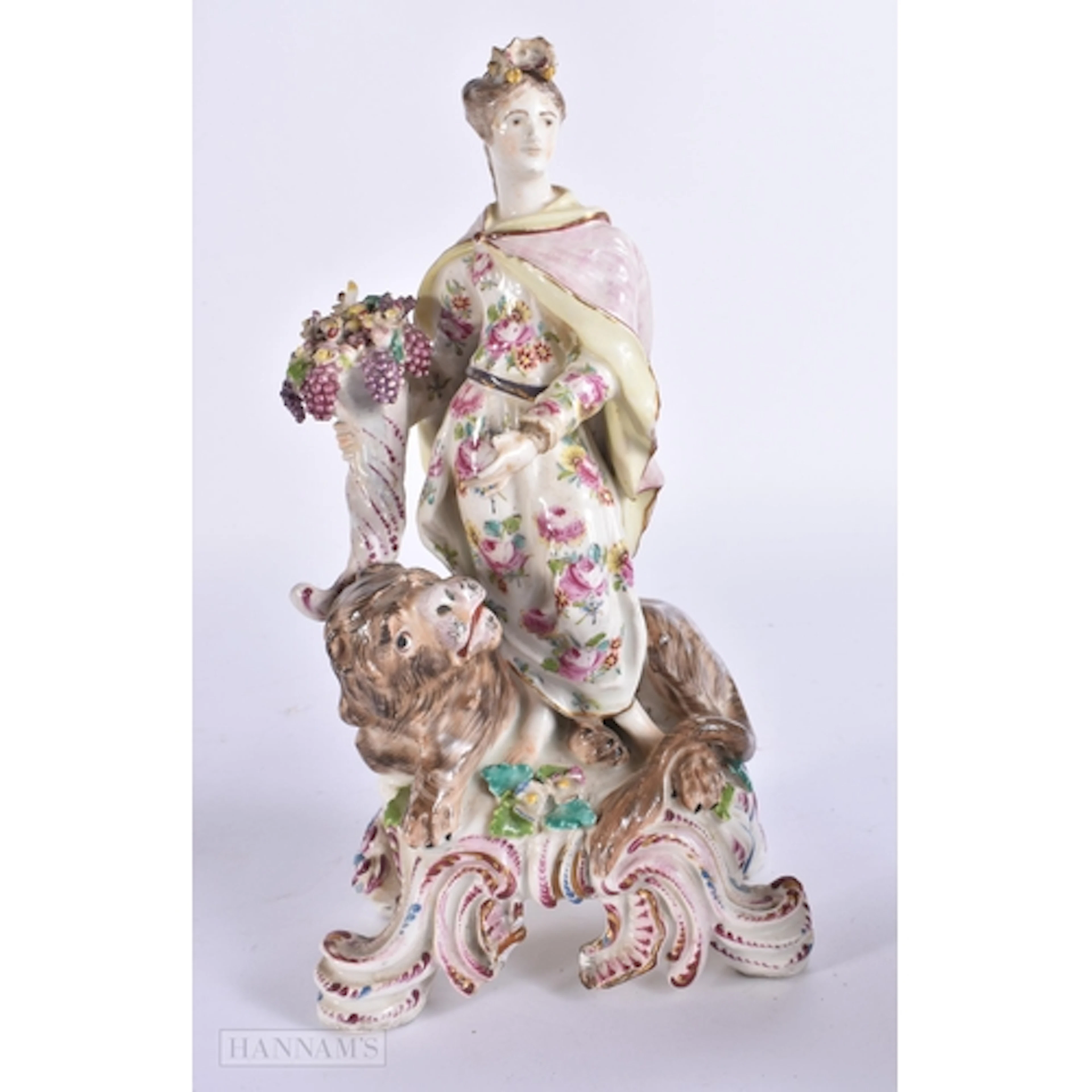 AN 18TH CENTURY BOW ALLEGORICAL PORCELAIN FIGURE OF A FEMALE...
