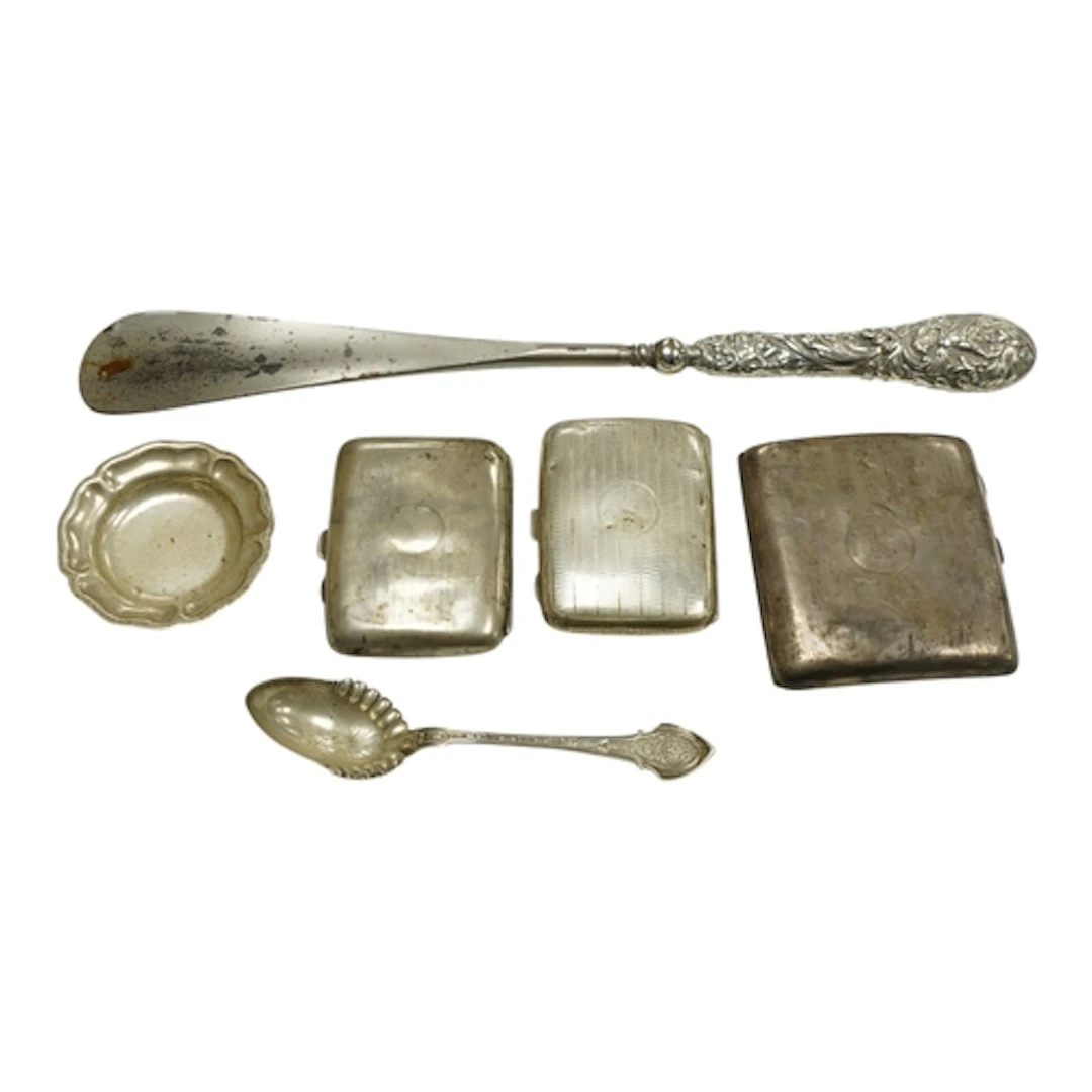 Three assorted silver cigarette cases, the largest Birmingha...