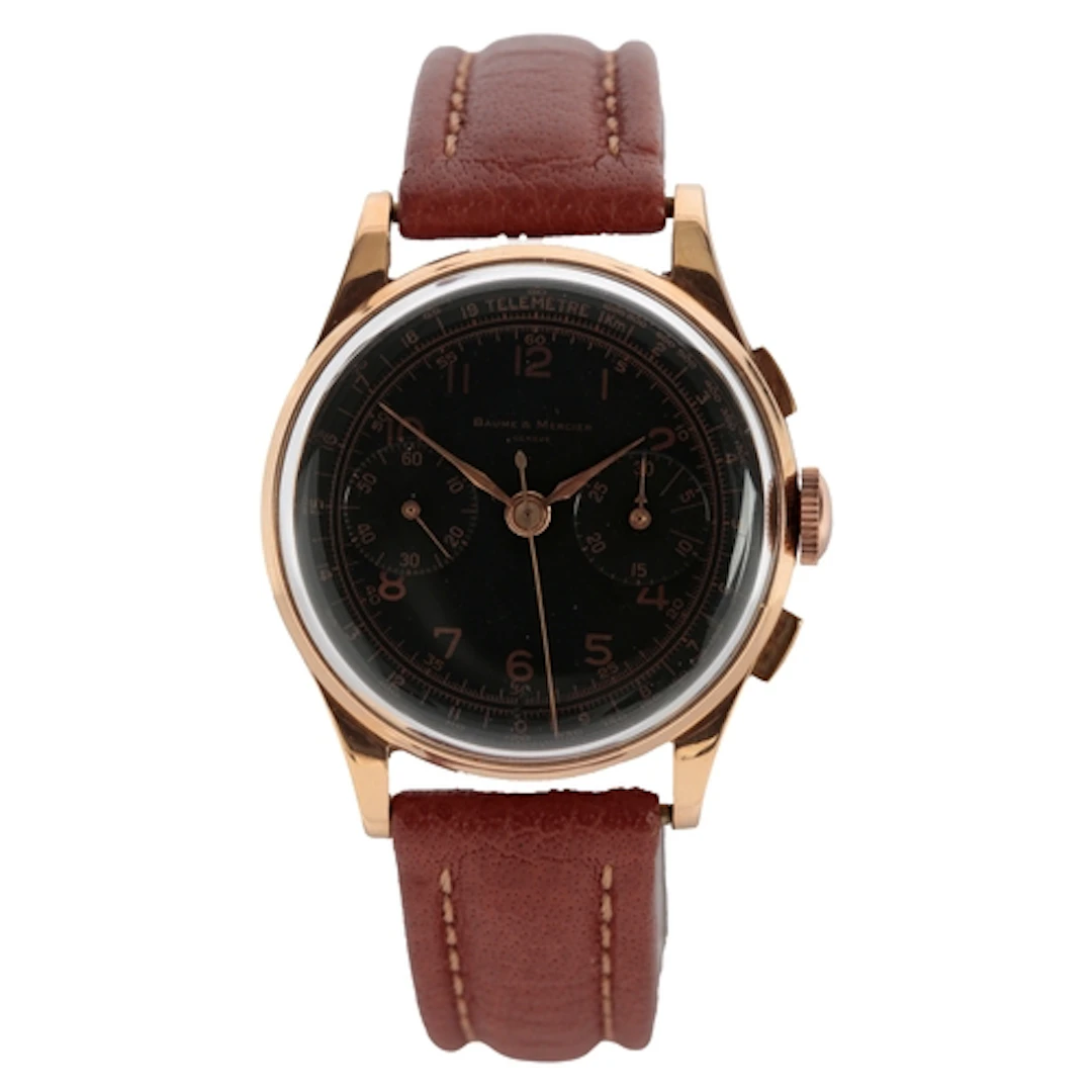 A gentleman's mid 20th century 18k gold Baume Mercier chrono...