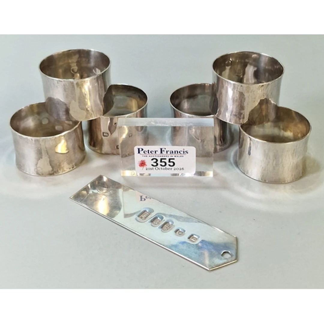 Set of Queen Elizabeth II silver napkin rings, Maker's marks...