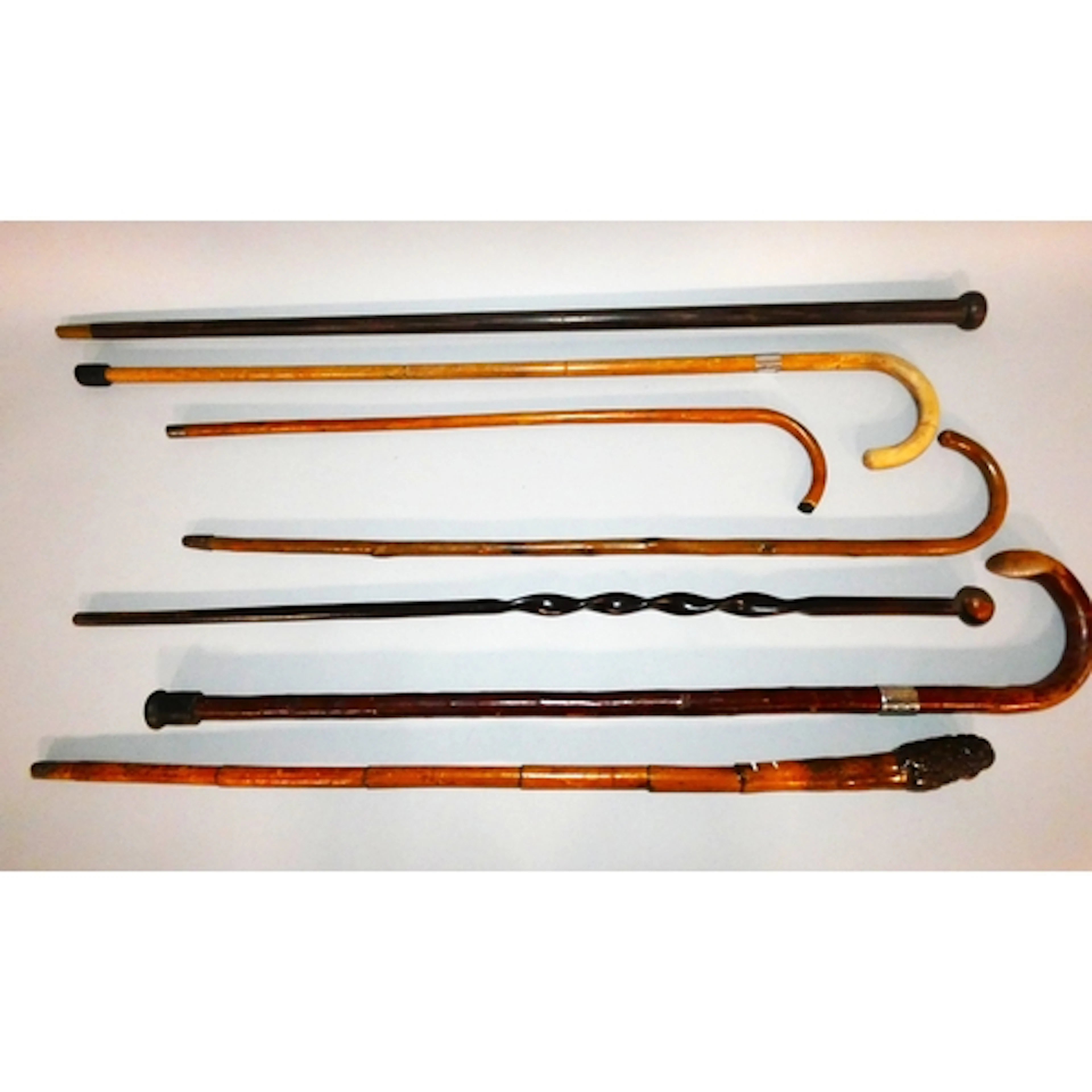 Group of Antique walking sticks to include a Chinese root ba...