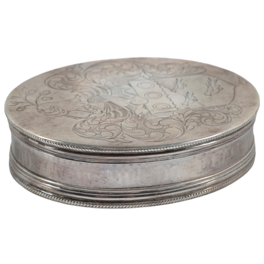 A late Charles II silver oval tobacco box, maker's mark only...