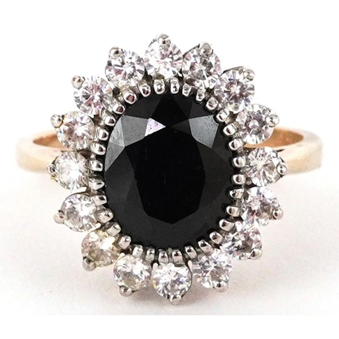 9ct gold blue stone and cubic zirconia cluster ring, size O/...