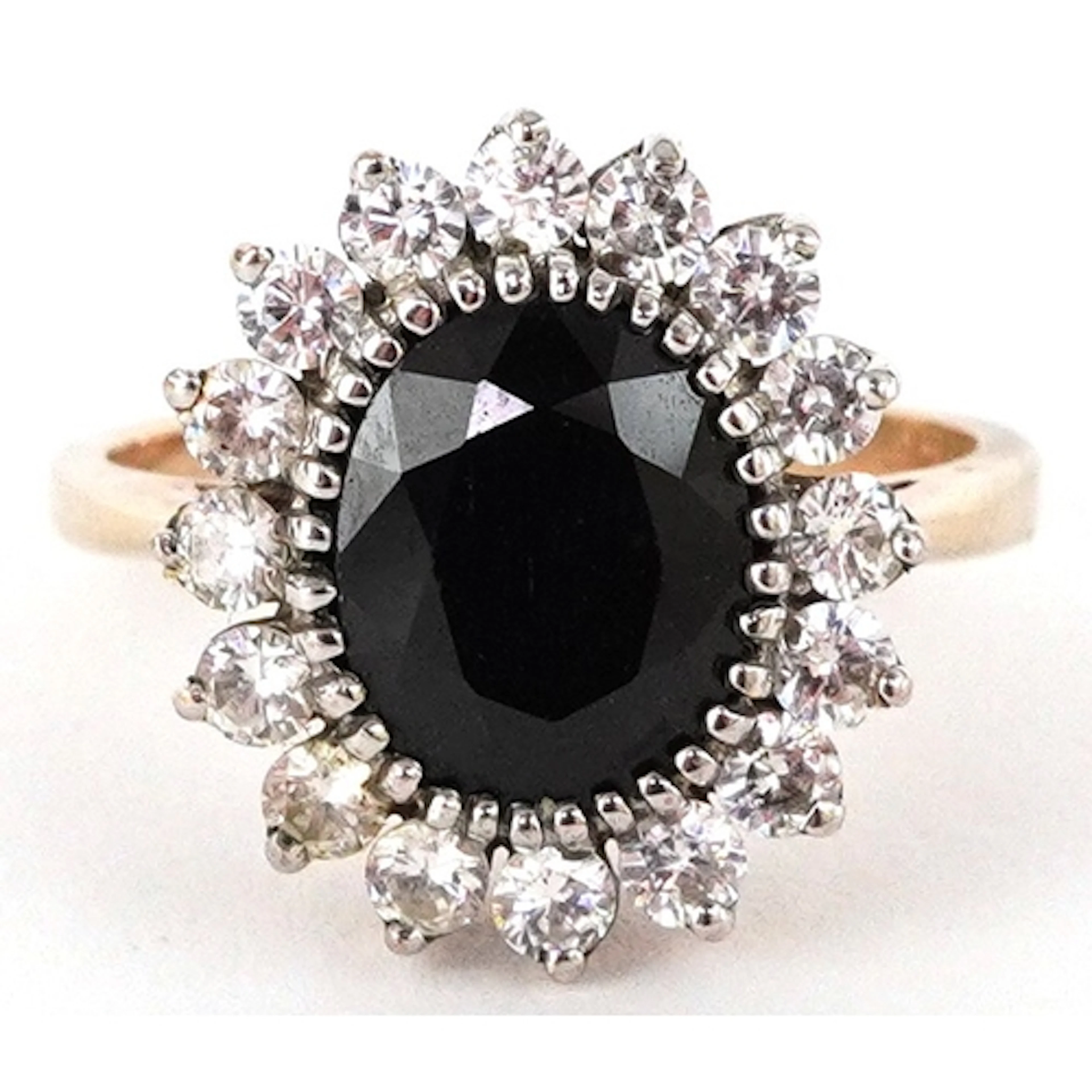 9ct gold blue stone and cubic zirconia cluster ring, size O/...